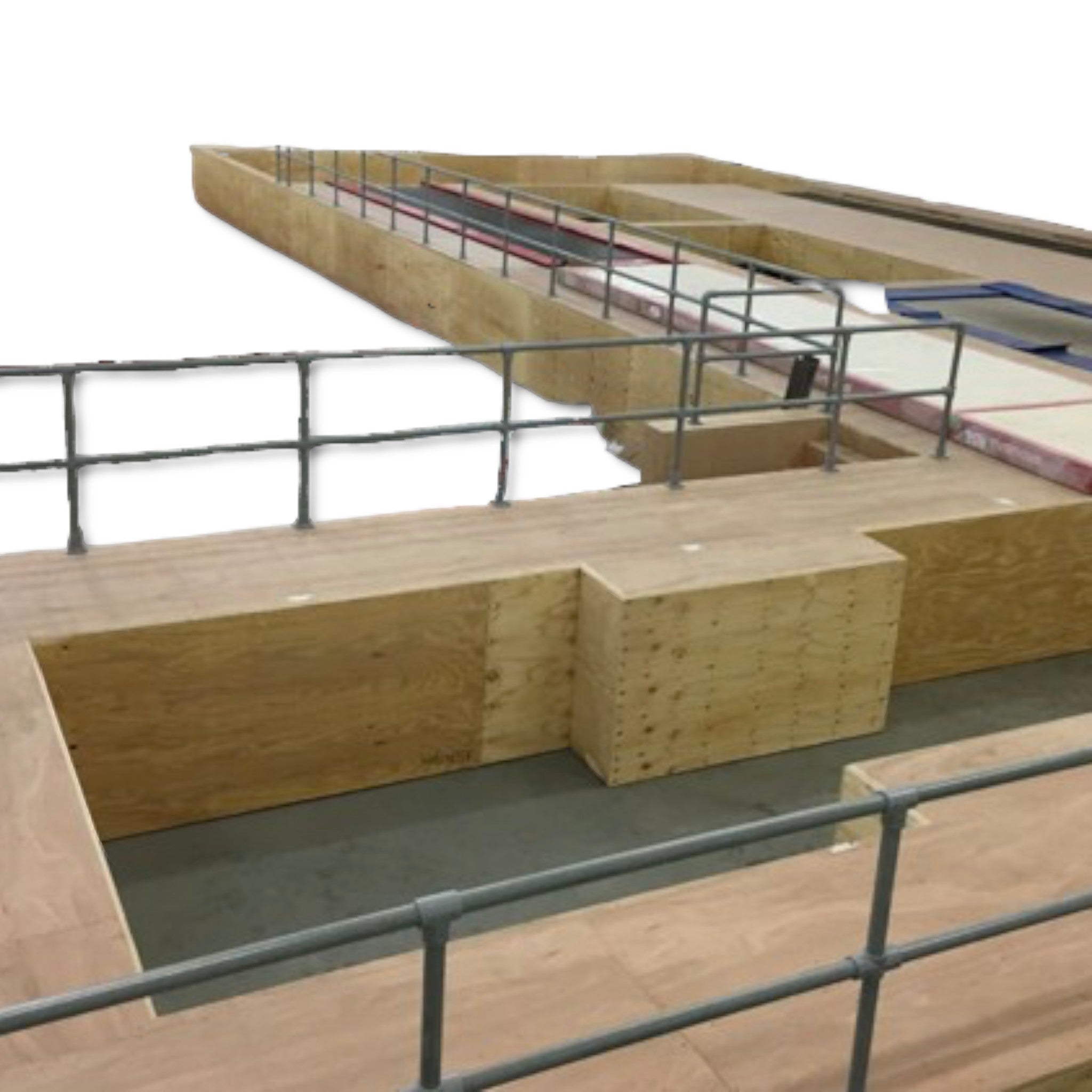 UK Gym Pits GRP handrail system with 4 way middle cross connectors installed on a wooden raised pit podium