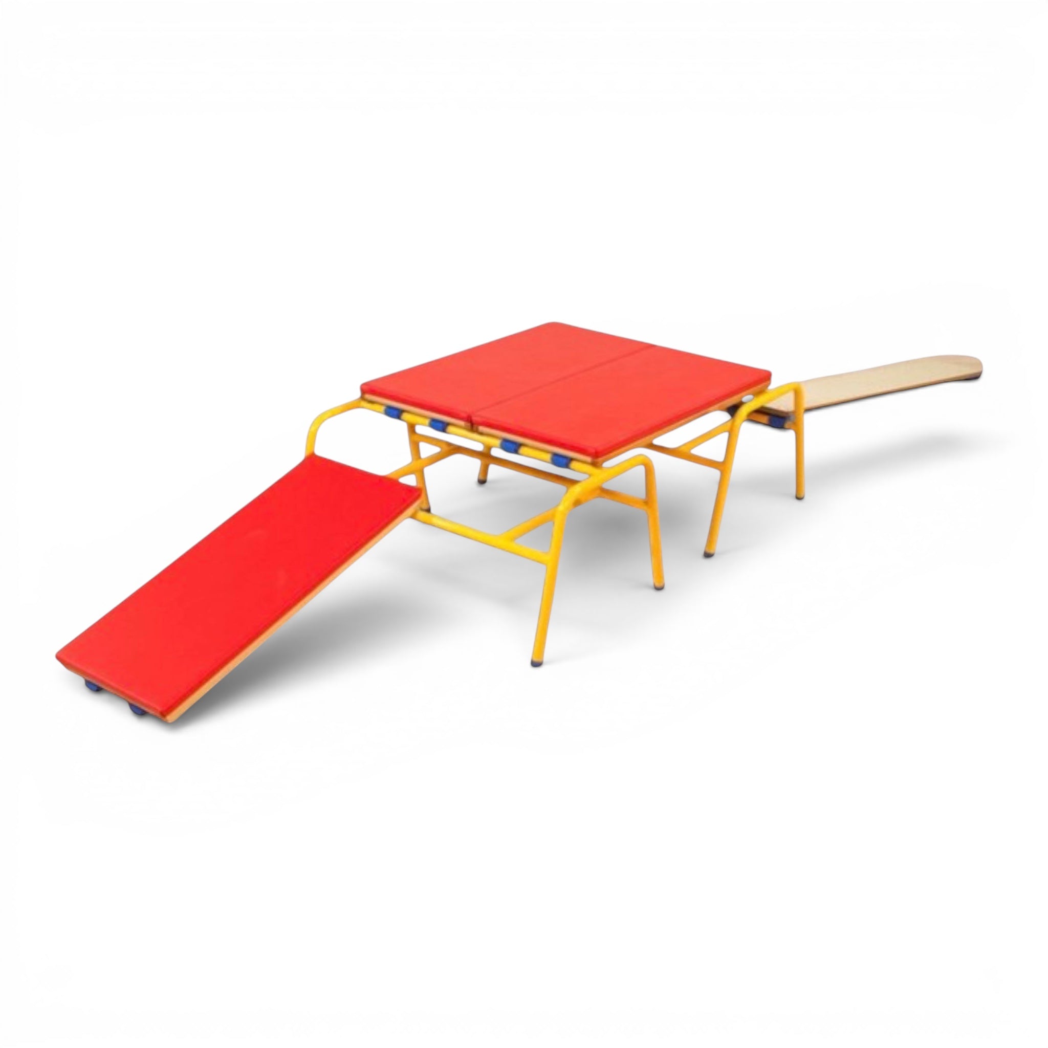 UK Gym Pits Gym Time Trestles with red padded tops and yellow tubular steel frames configured as an agility table.