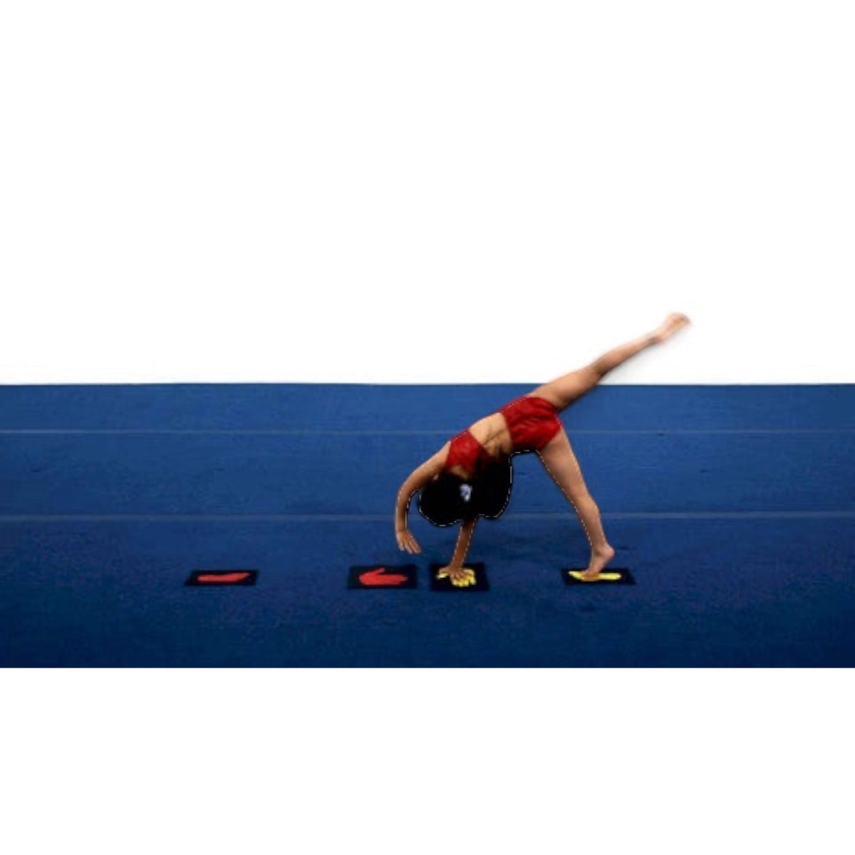 UK Gym Pits velcro hand and feet markers on a blue mat, helping a young gymnast practice a cartwheel