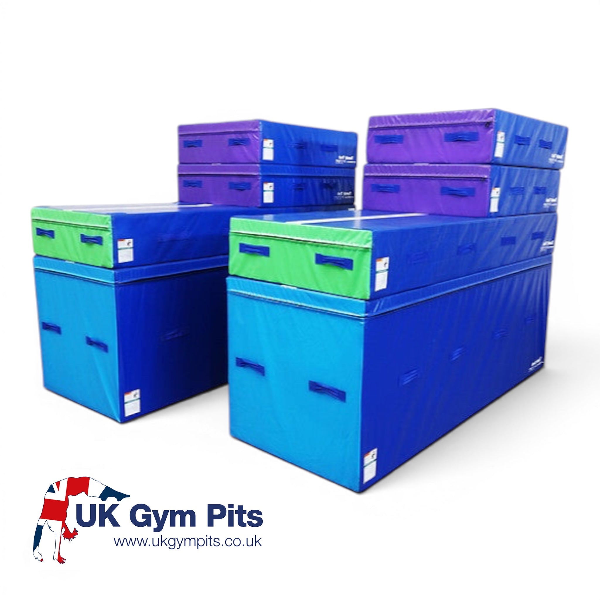 UK Gym Pits smart spotting blocks in blue, green, and purple vinyl foam for gymnastics training and skill progression