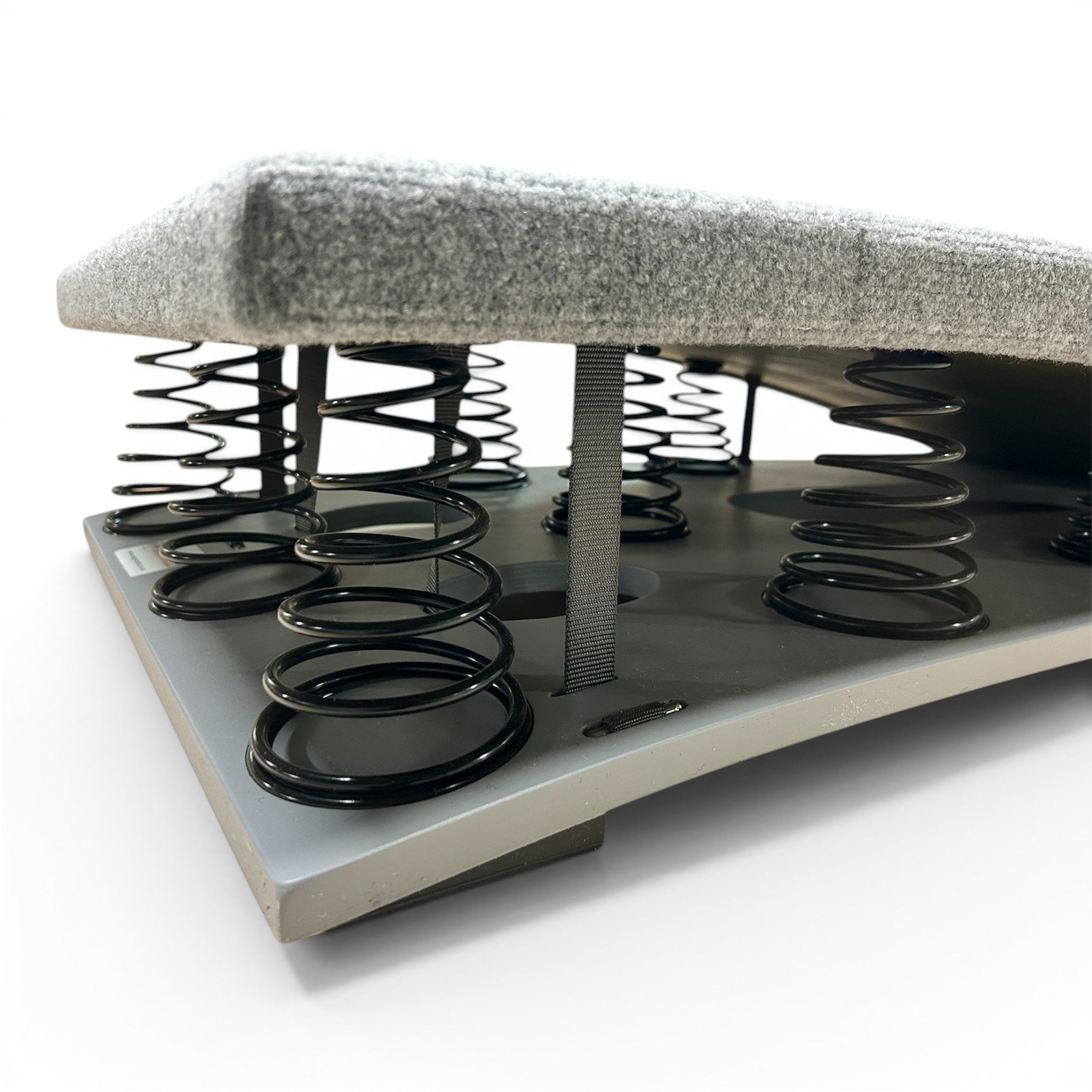UK Gym Pits FIG approved gymnastics springboard with grey carpeted surface and black tapered HDI springs