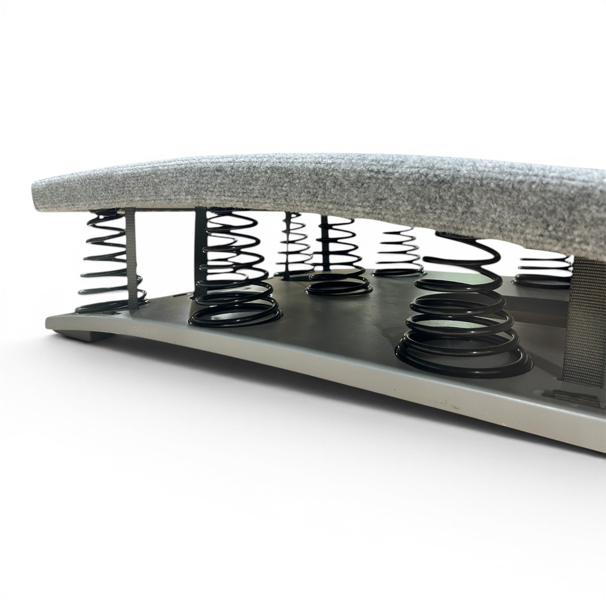 UK Gym Pits FIG approved gymnastics springboard with grey carpeted surface and black tapered steel springs