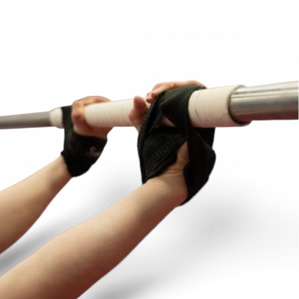 UK Gym Pits swing straps with neoprene padding secured around a gymnastics bar for safe training