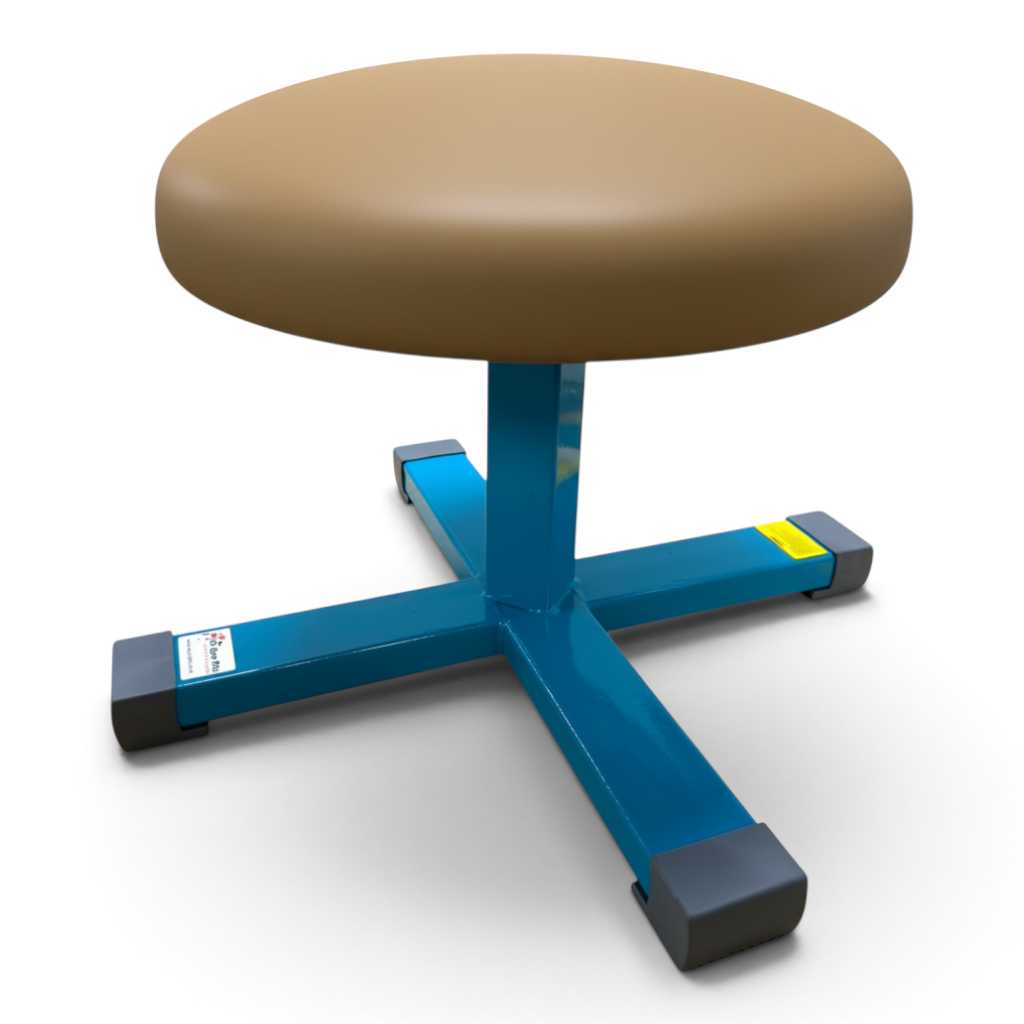 UK Gym Pits height-adjustable gymnastics training mushroom with a tan PU leatherette top and blue steel base.