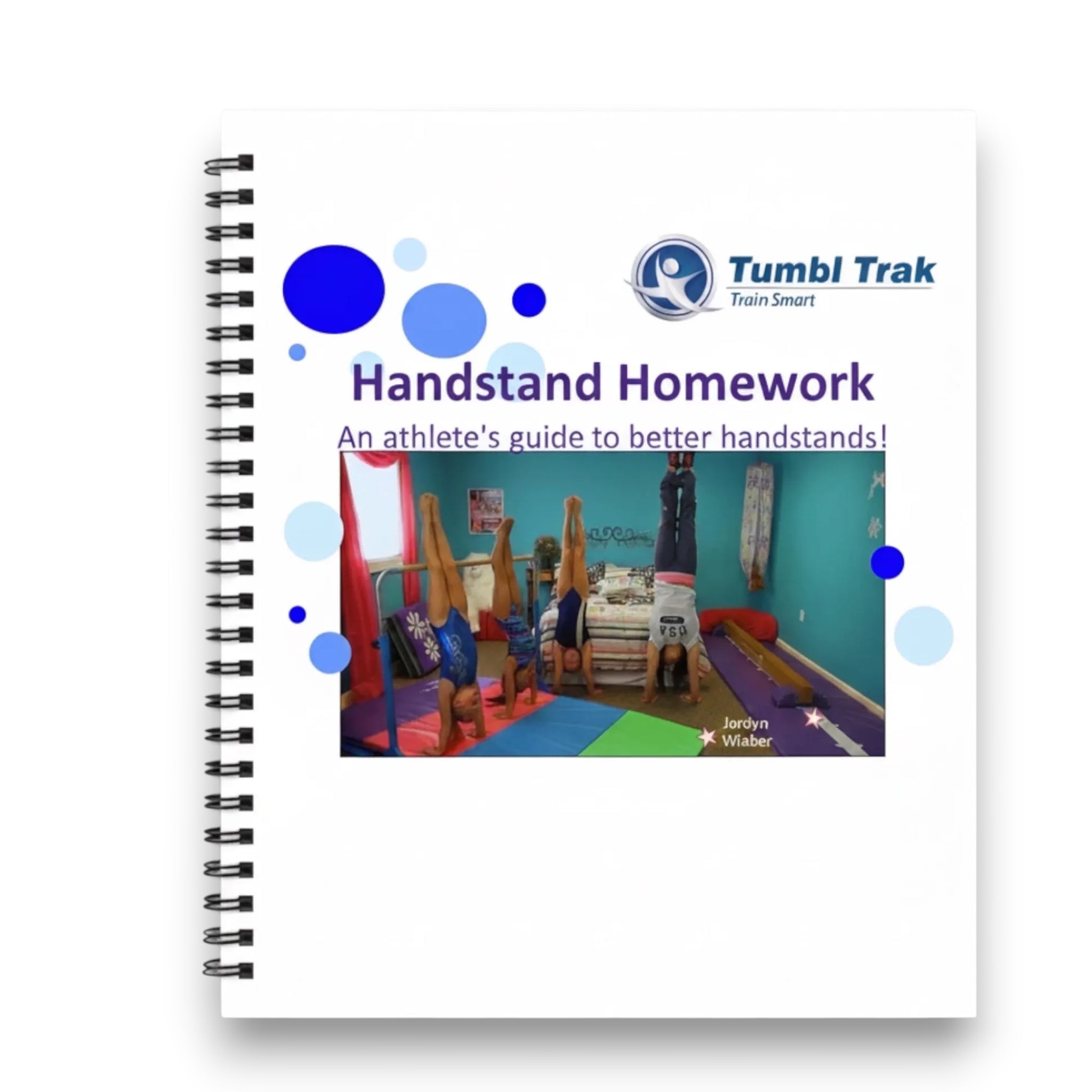 UK Gym Pits Handstand Homework spiral-bound workbook cover featuring gymnasts practicing handstands
