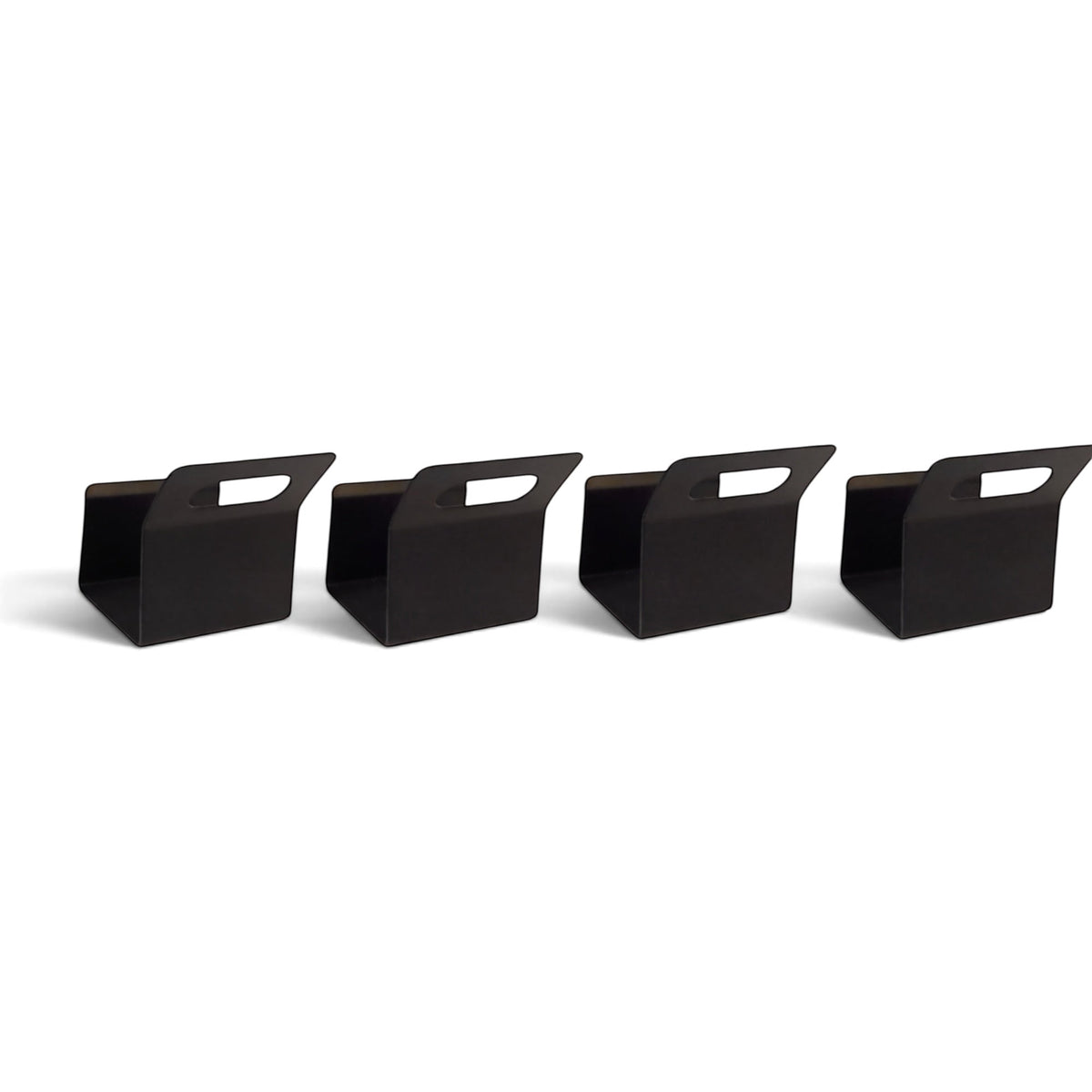 Set of four black UK Gym Pits replacement door clips for handstand homework mats on a white background.