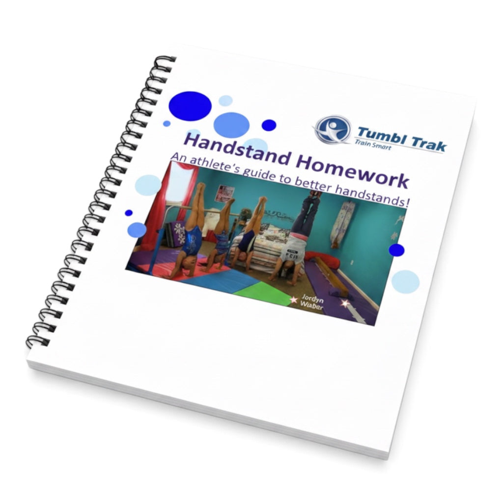 UK Gym Pits Handstand Homework workbook with spiral binding and cover photo of young gymnasts practicing handstands