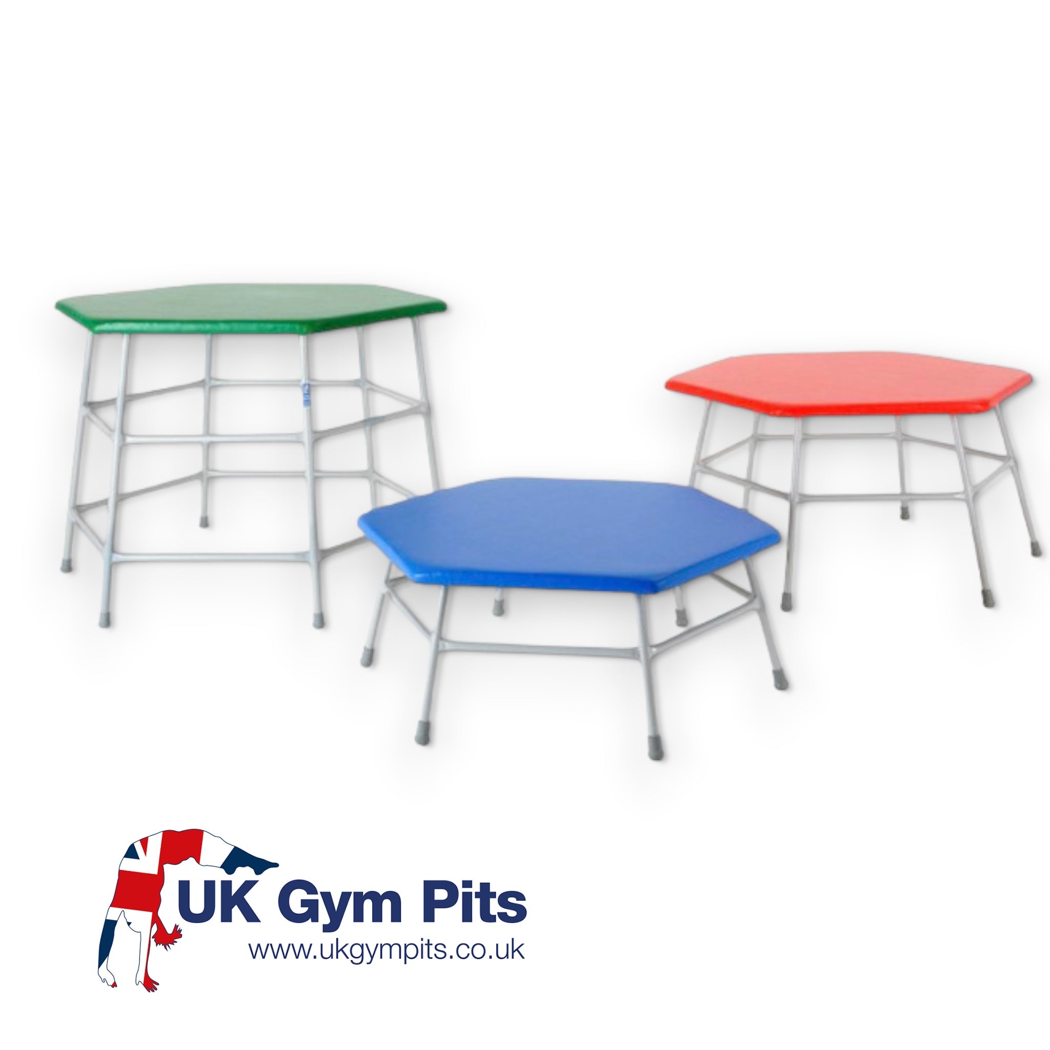 UK Gym Pits hexagonal movement tables with padded PVC tops in green, red, and blue on grey steel frames.