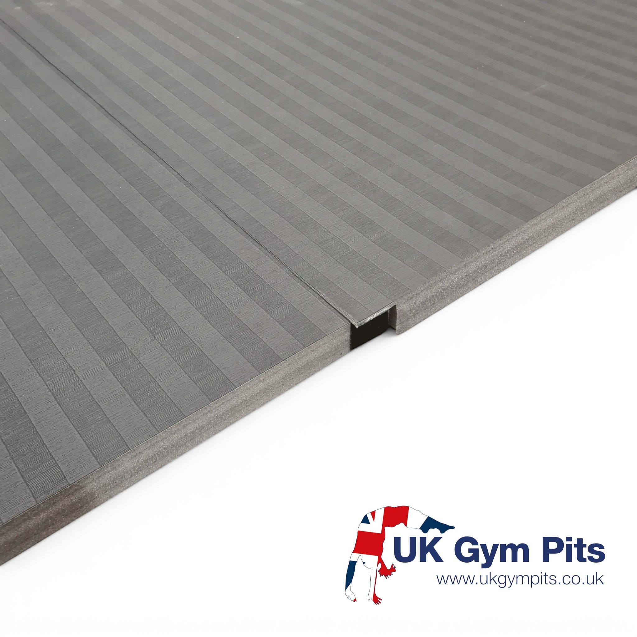 UK Gym Pits Hybrid Connect mat roll featuring a durable grey tatami-textured PVC surface and shock-absorbing XPE foam.