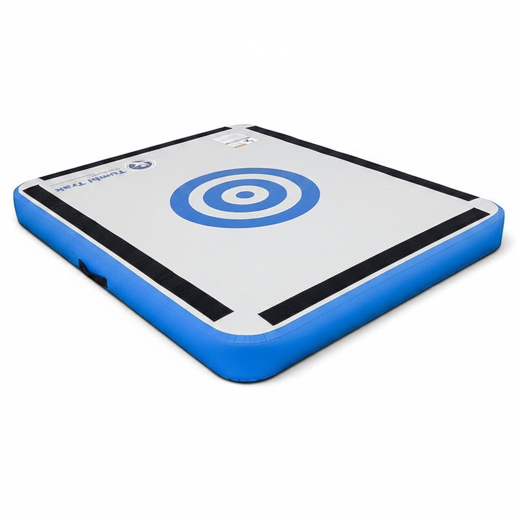 UK Gym Pits inflatable launch pad with blue and grey target design for gymnastics training and tumbling drills