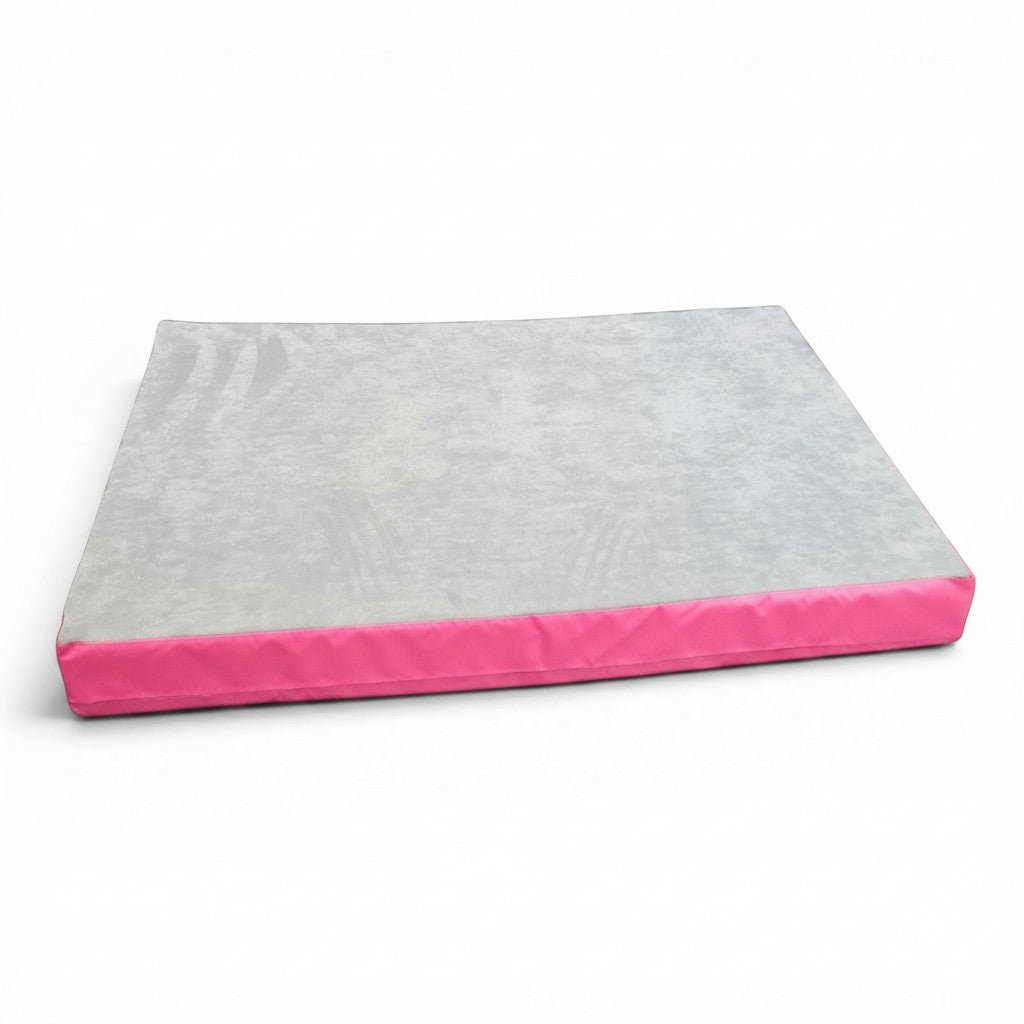 UK Gym Pits jersey topped crash mat with a grey fabric surface and pink PVC sides for gymnastics and martial arts.
