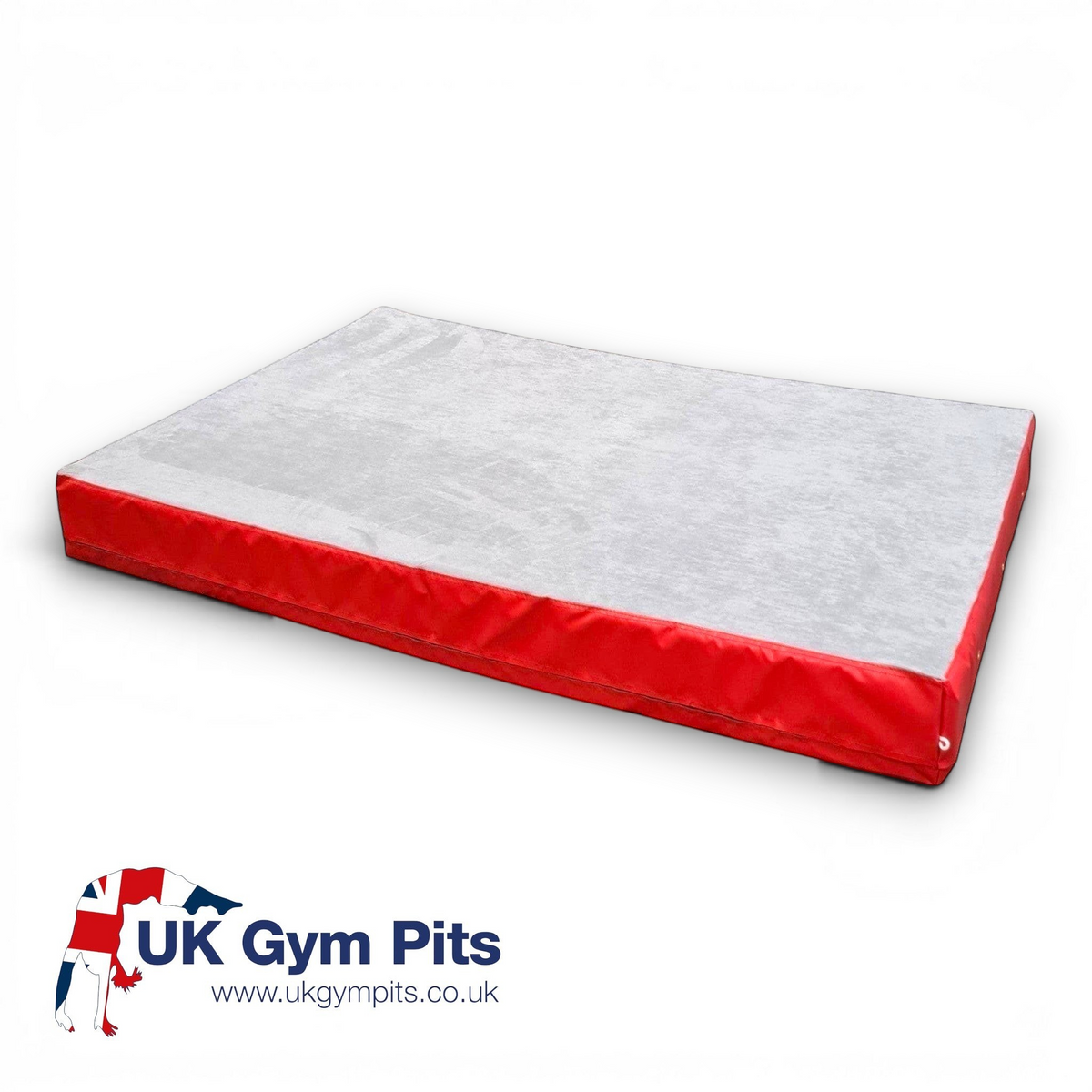 UK Gym Pits jersey-topped crash mat with a grey fabric surface and red PVC sides for gymnastics and martial arts.