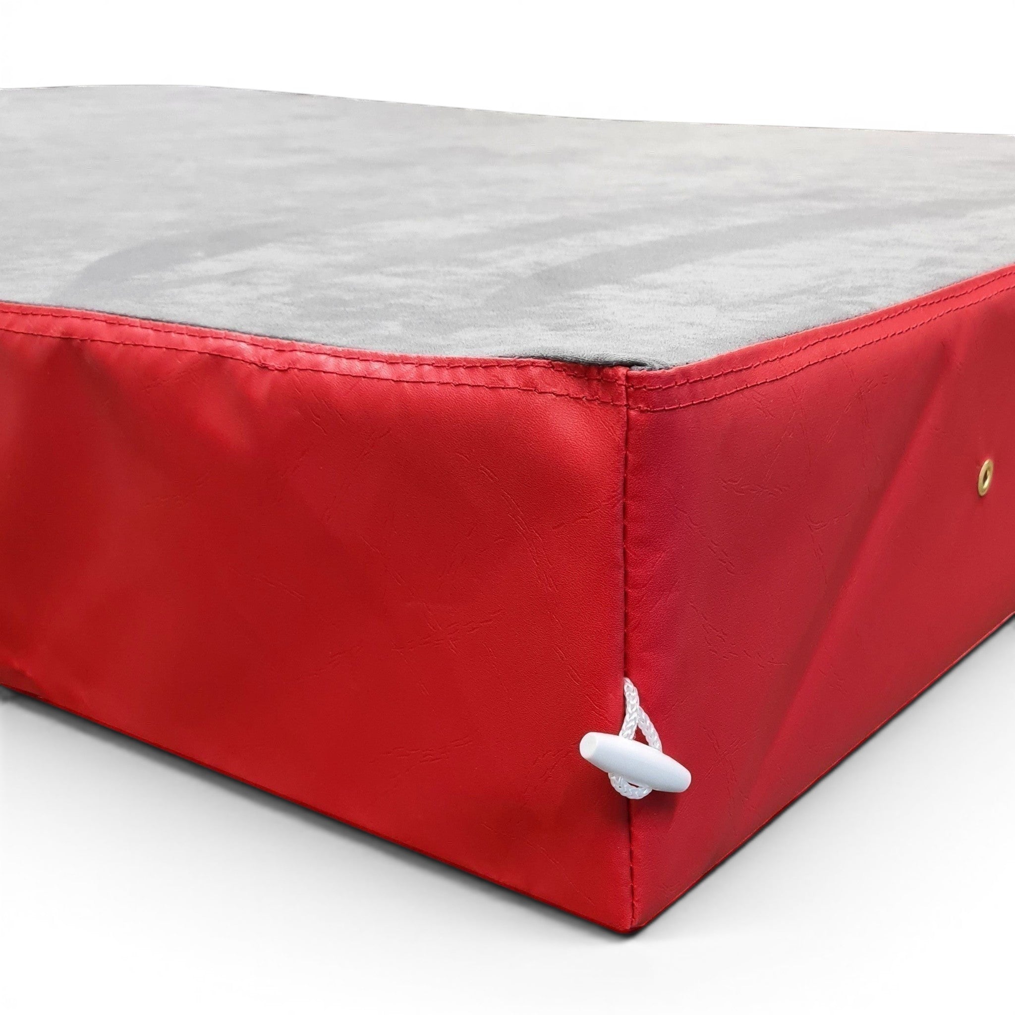 UK Gym Pits jersey topped crash mat with a grey fabric surface and red PVC sides featuring a white toggle connector.