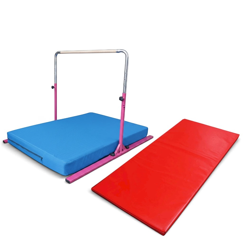 UK Gym Pits Junior Bar Pro package with a pink adjustable gymnastics bar, blue practice mat, and red build-a-mat panel.