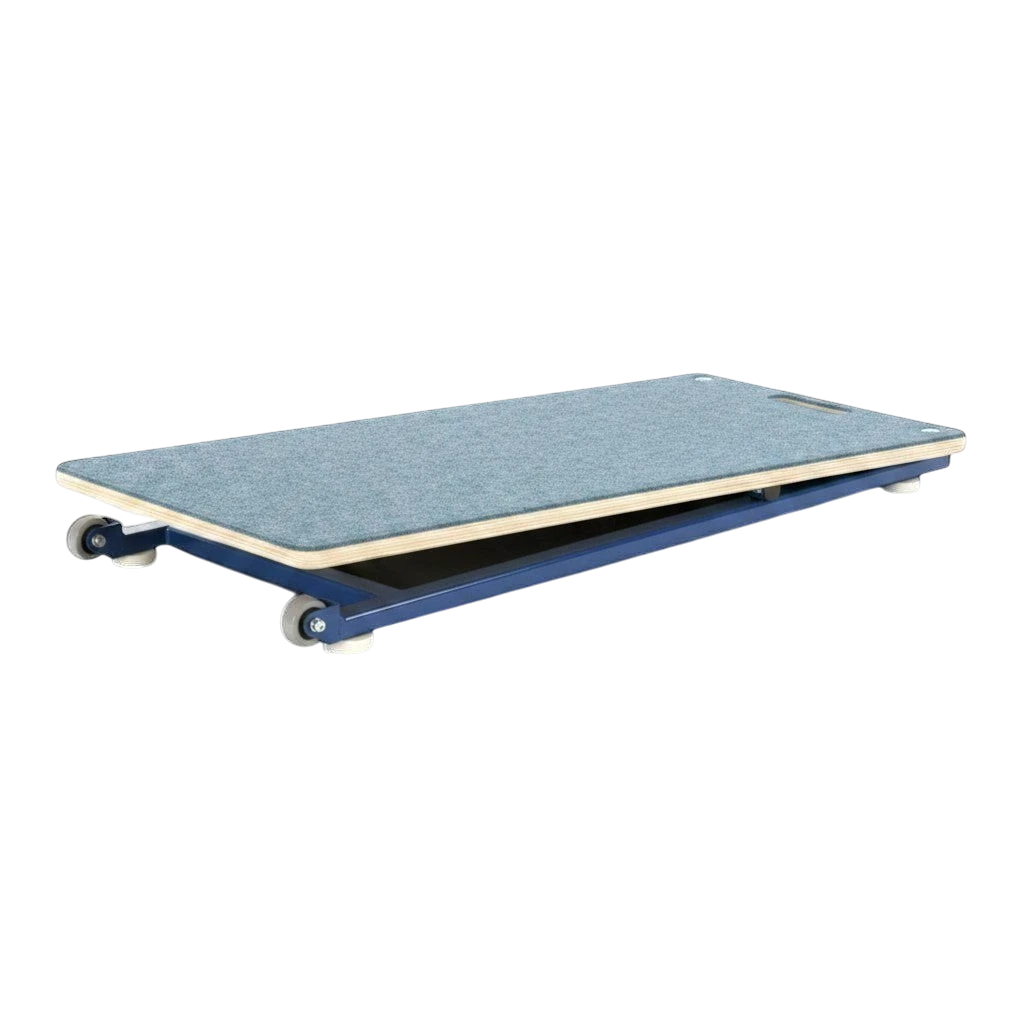 UK Gym Pits junior gymnastics springboard with blue carpeted surface and powder coated steel frame on wheels
