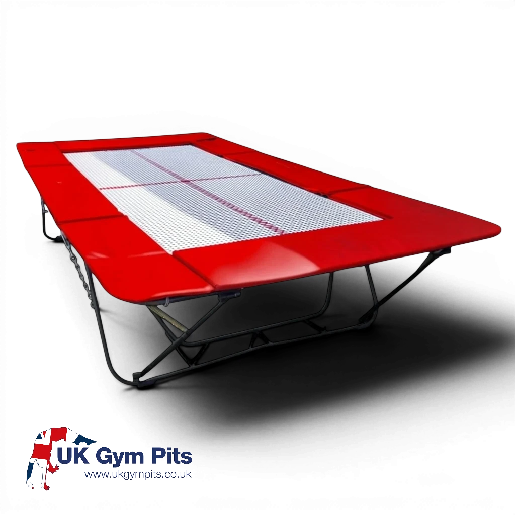 UK Gym Pits junior trampoline with a white web bed and red protective frame pads on a black background