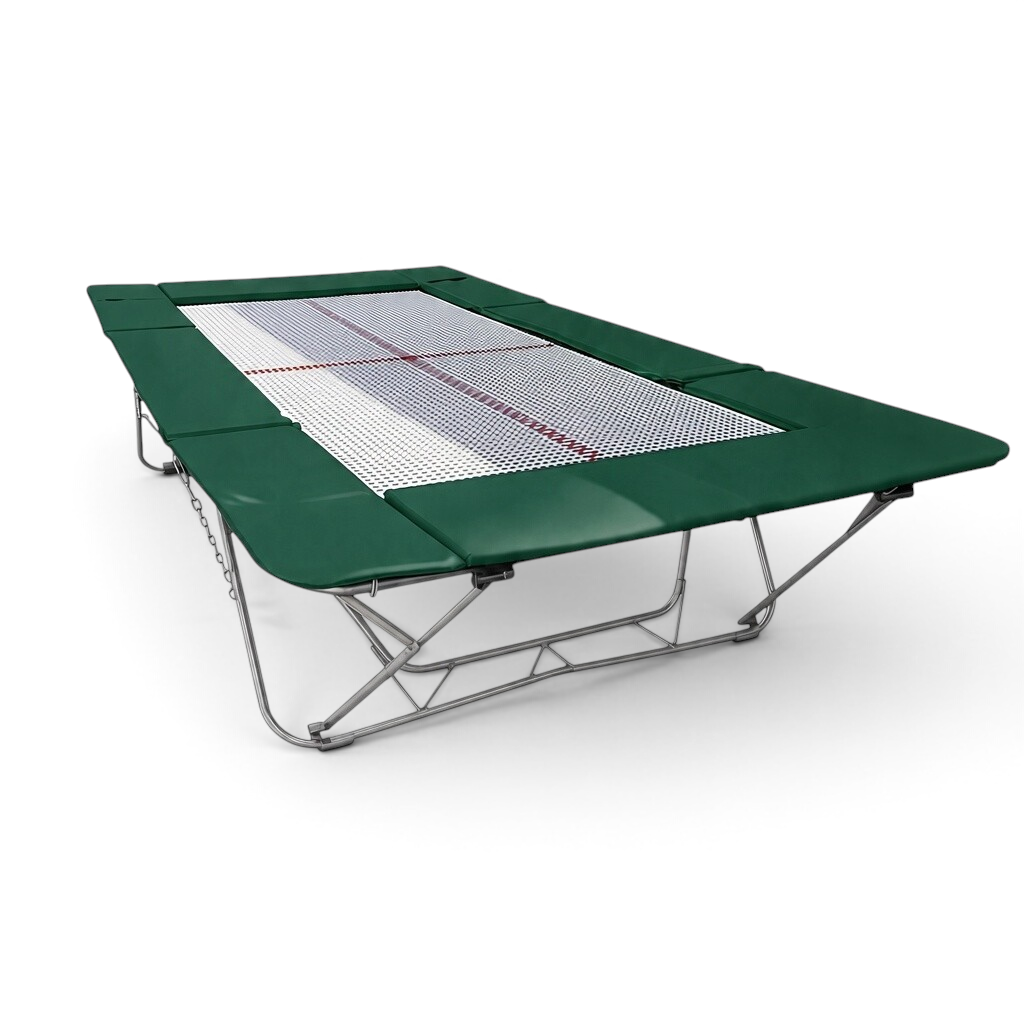 UK Gym Pits junior trampoline with a white web bed and green protective frame pads for gymnastics and home training.