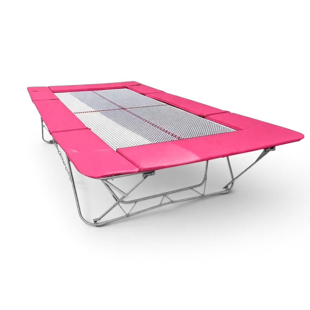 UK Gym Pits junior trampoline with a white web bed and vibrant pink protective frame pads on a steel frame