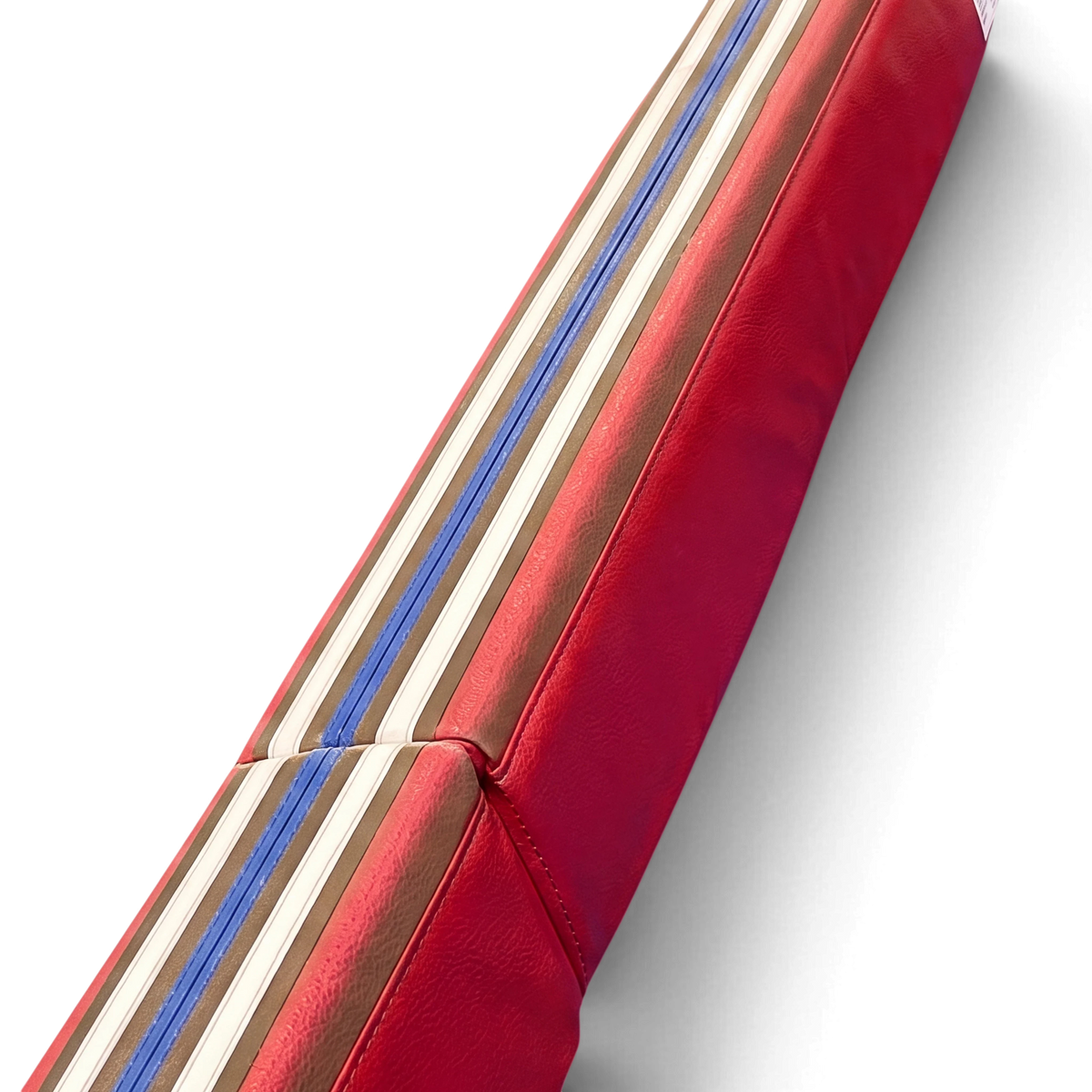 UK Gym Pits laser balance beam training pad with red suede surface and visual cueing lines for gymnastics practice