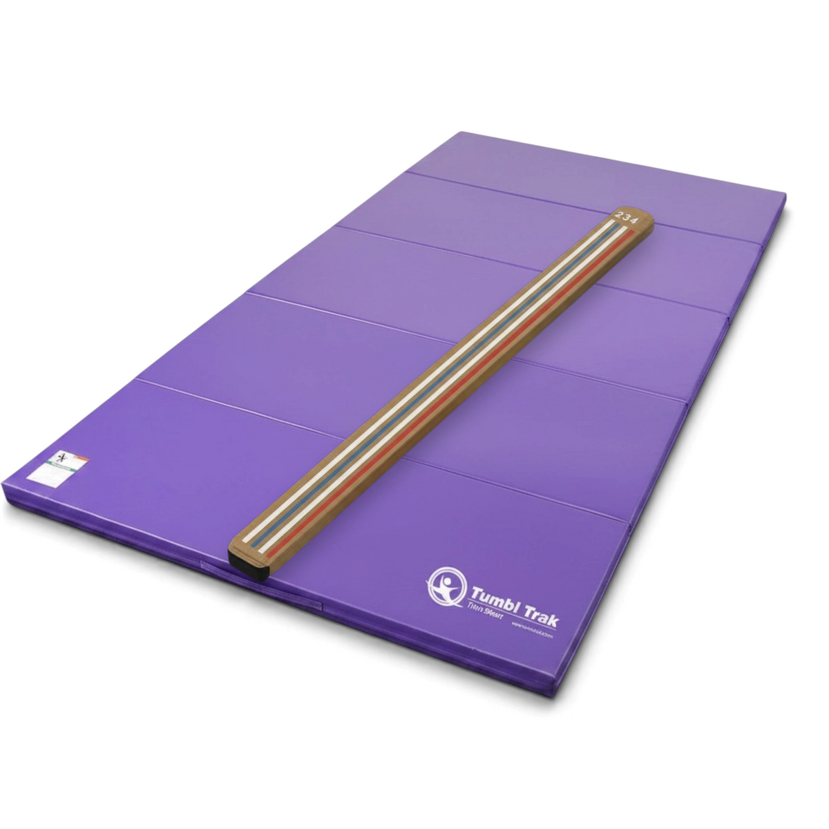 UK Gym Pits laser balance beam with marked lines on a purple folding tumbling mat for gymnastics training