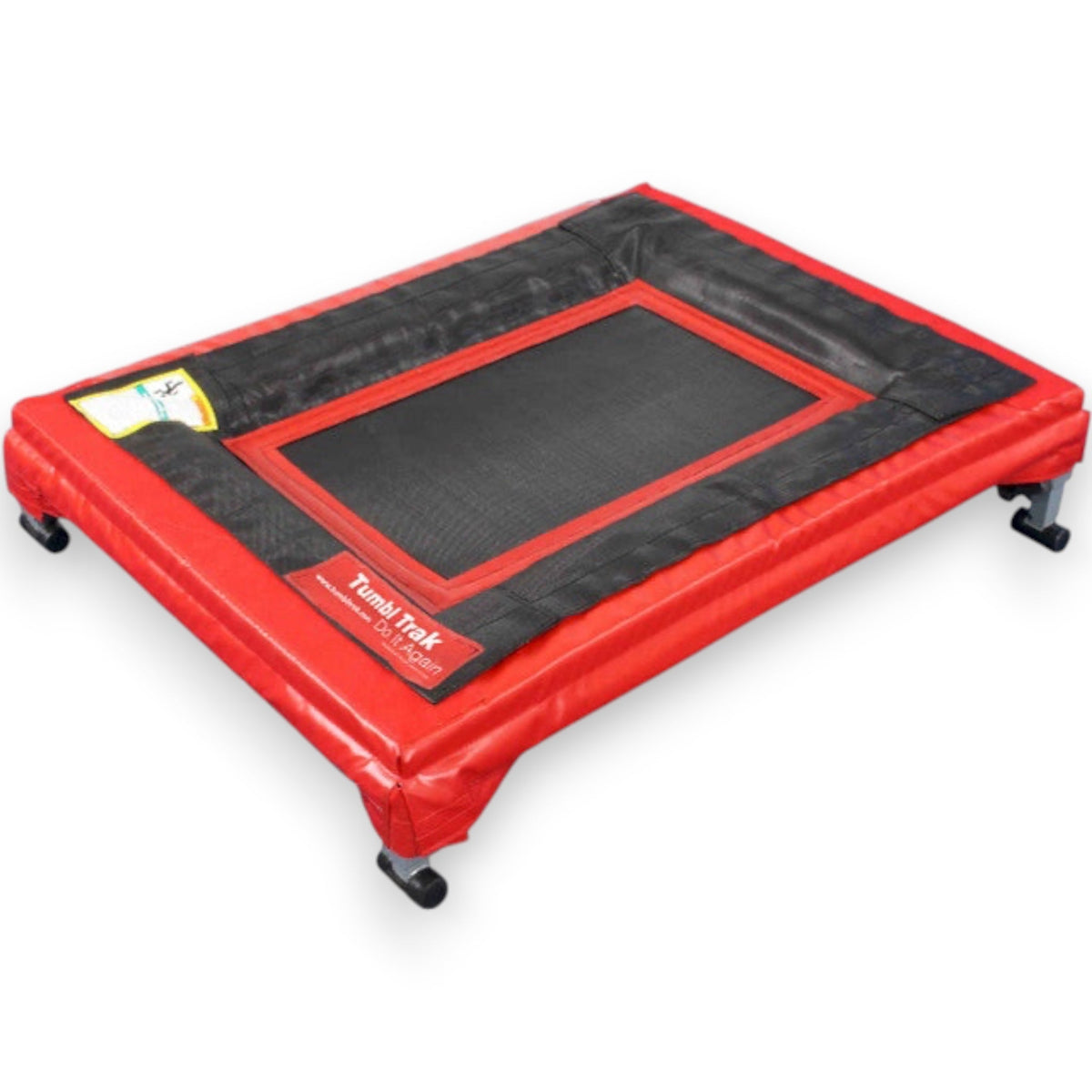 UK Gym Pits mini trak gymnastics vault trainer with a black bed, red safety pads, and an aluminium frame.