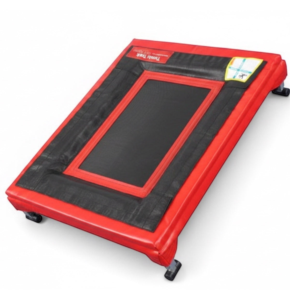 UK Gym Pits Mini Trak vault and tumbling trainer with a black polypropylene bed, red safety pads, and silver frame.