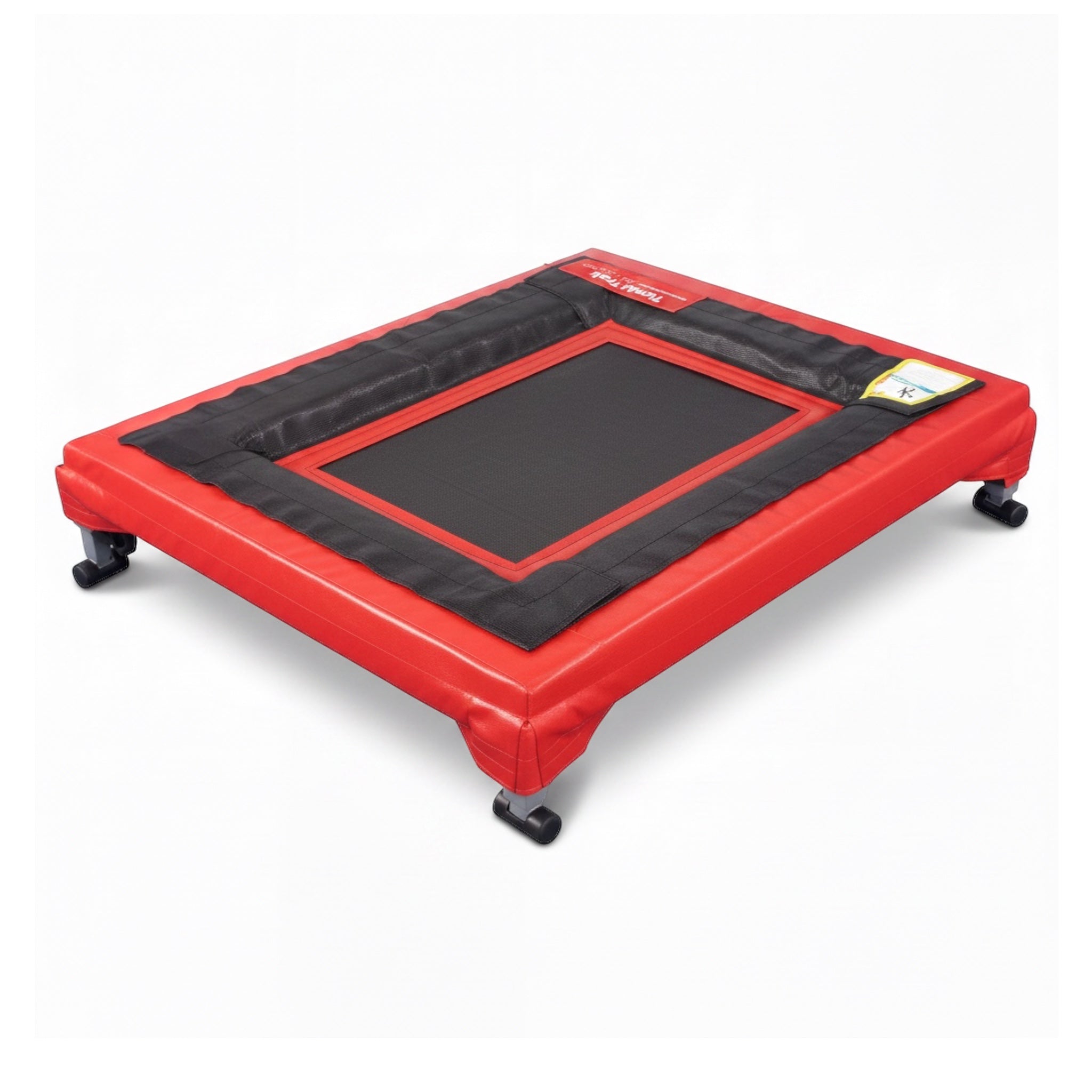 UK Gym Pits Mini Trak tumbling trainer with a black polypropylene bed, red safety pads, and adjustable height frame.