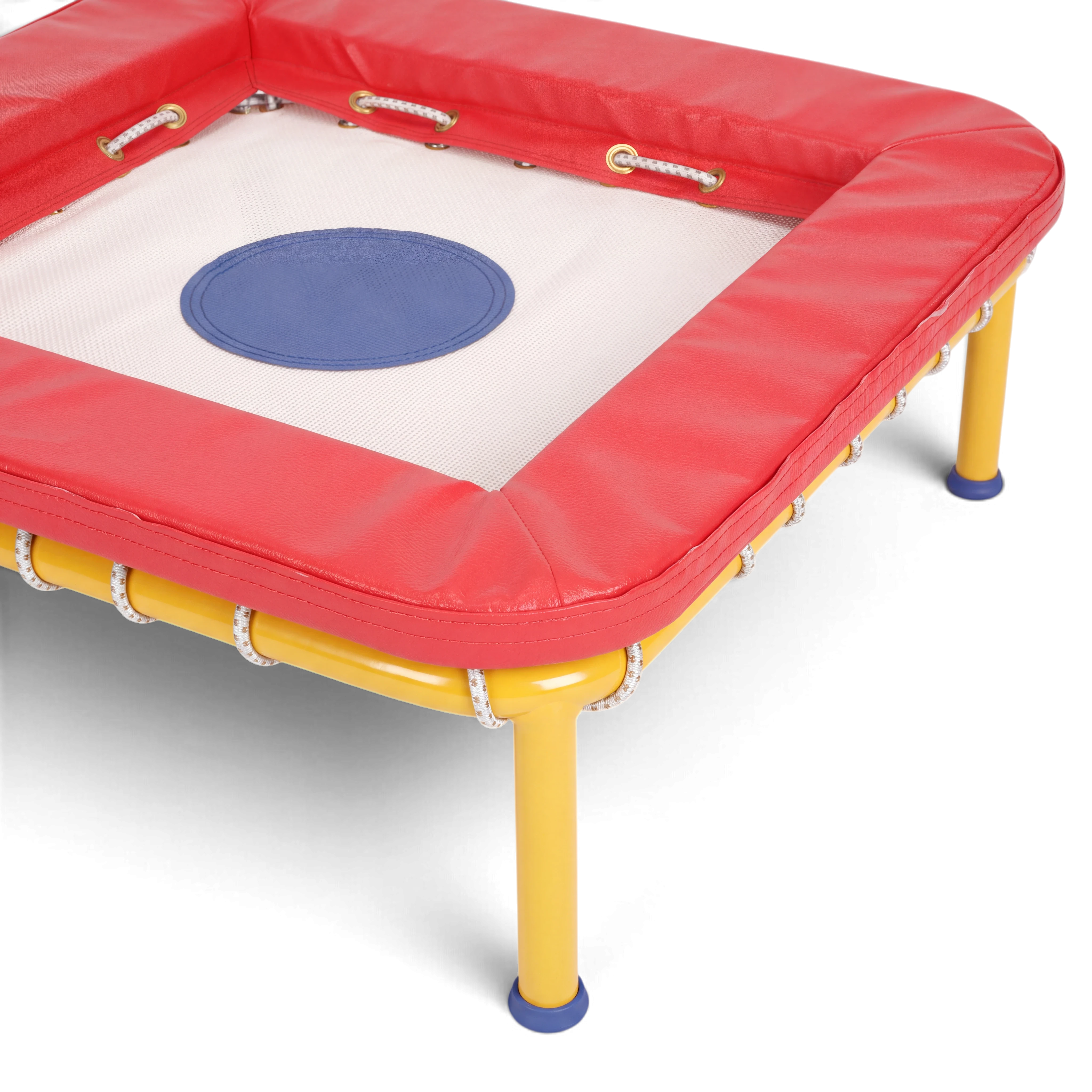 UK Gym Pits Activ Bounce mini trampette with a white bed, red foam padding, and a yellow powder-coated steel frame.
