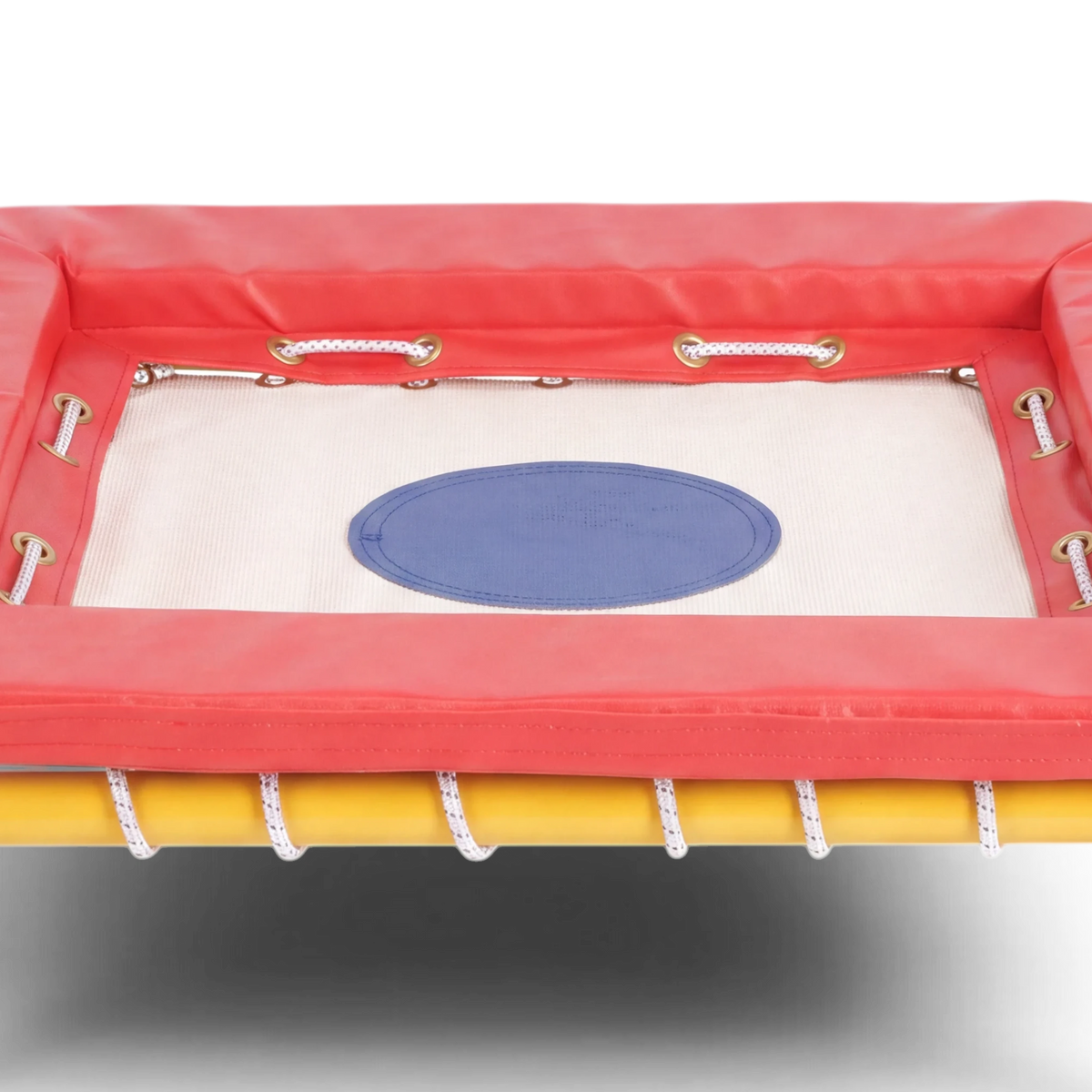 UK Gym Pits Activ Bounce mini trampette with a white bed, blue center, red foam padding, and yellow steel frame.