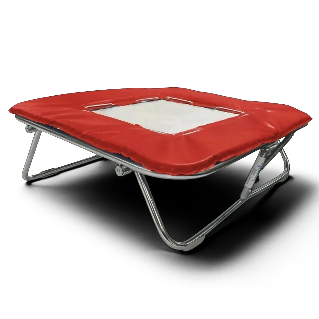 UK Gym Pits super mini trampoline with a white solid super-mesh bed and red protective frame pads on a metal frame.