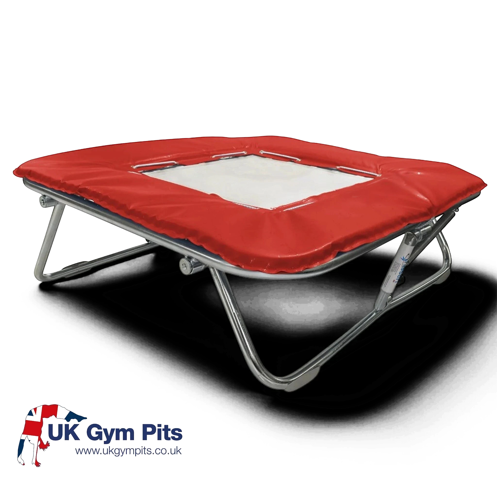 UK Gym Pits super mini trampoline with a solid white super-mesh bed and protective red coverall frame pads.