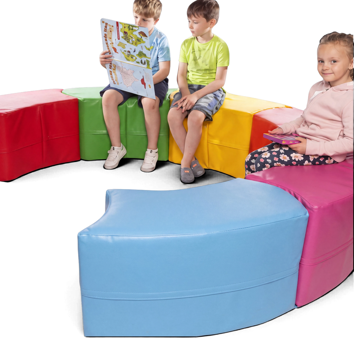 UK Gym Pits modular snake seating in various bright colours, used by children for soft play and comfortable seating.