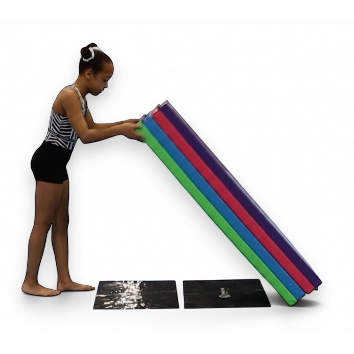 UK Gym Pits non-slip silicone smart mat sheets placed on the floor under a stack of colourful vinyl gym mats