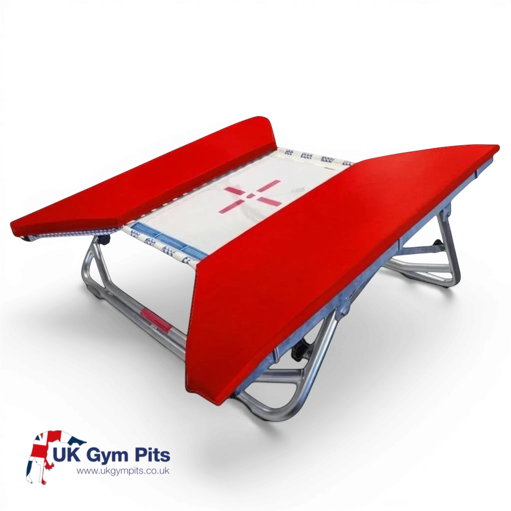 UK Gym Pits open ended mini trampoline with a white web bed and vibrant red protective frame pads on a zinc frame.