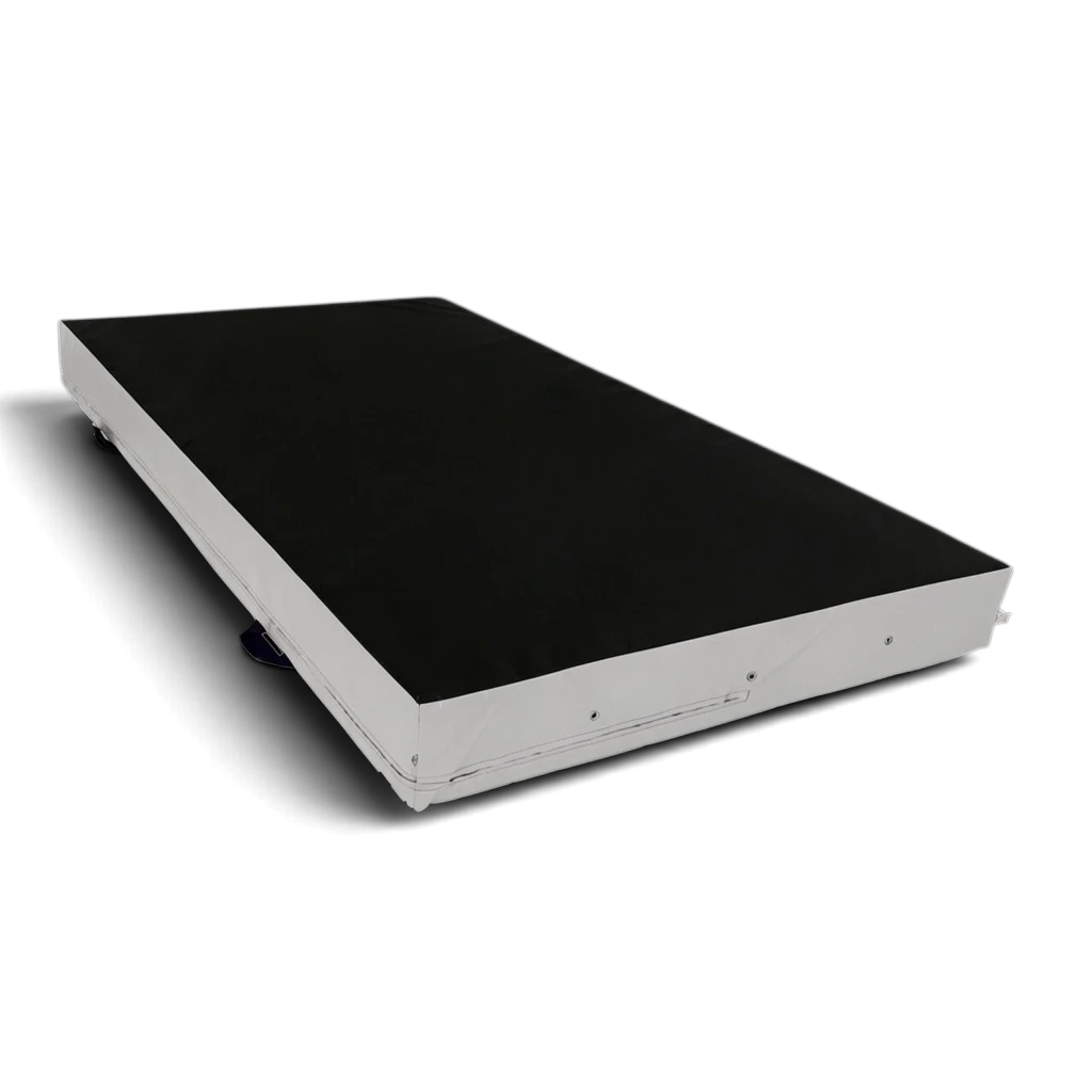 UK Gym Pits parkour landing mat with a black top and white sides, featuring durable PVC and corner toggles.