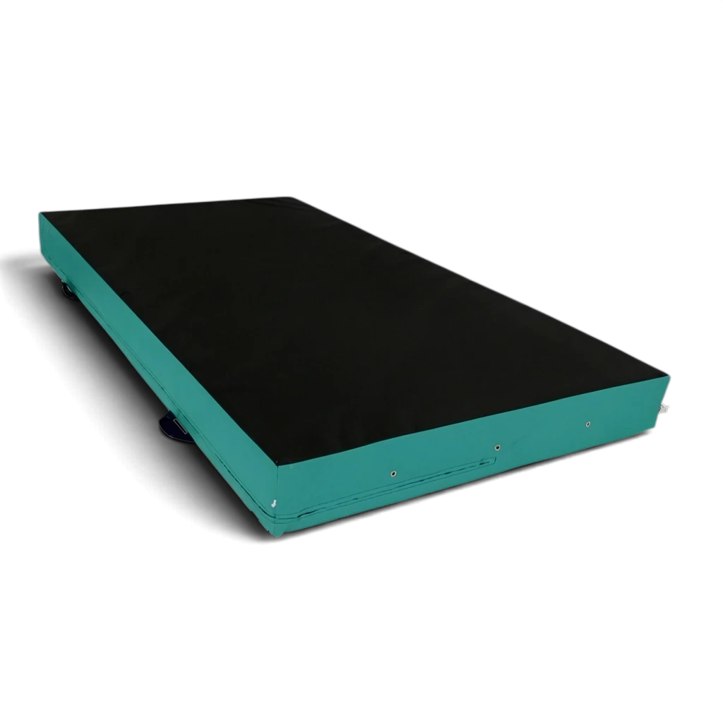 UK Gym Pits parkour landing mat with a black top and teal sides, featuring durable PVC and corner toggles.