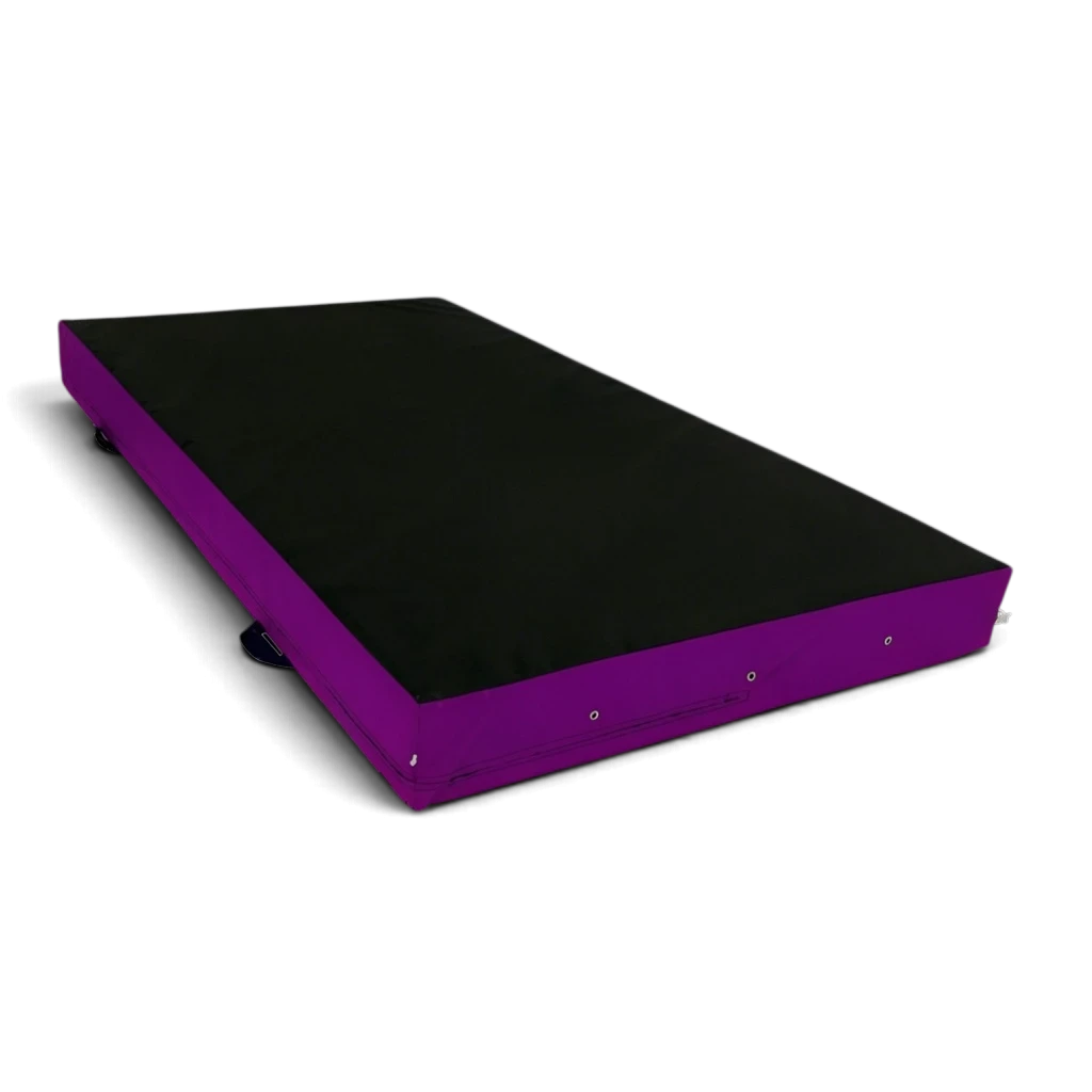 UK Gym Pits parkour landing mat with a black top and purple sides, featuring corner toggles and carry handles.
