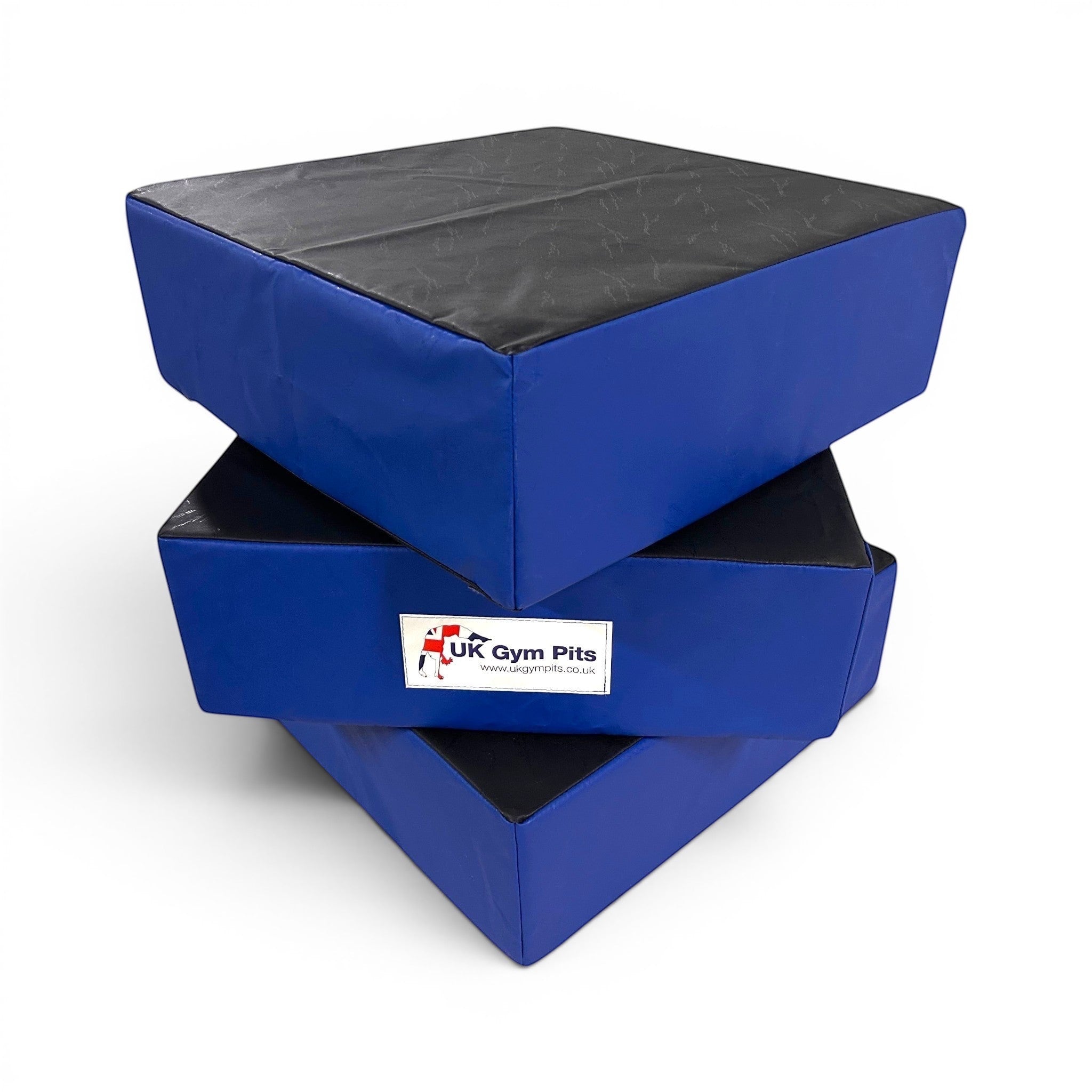 UK Gym Pits parkour stepping blocks in black and royal blue, stacked in a set of three for training jumps.