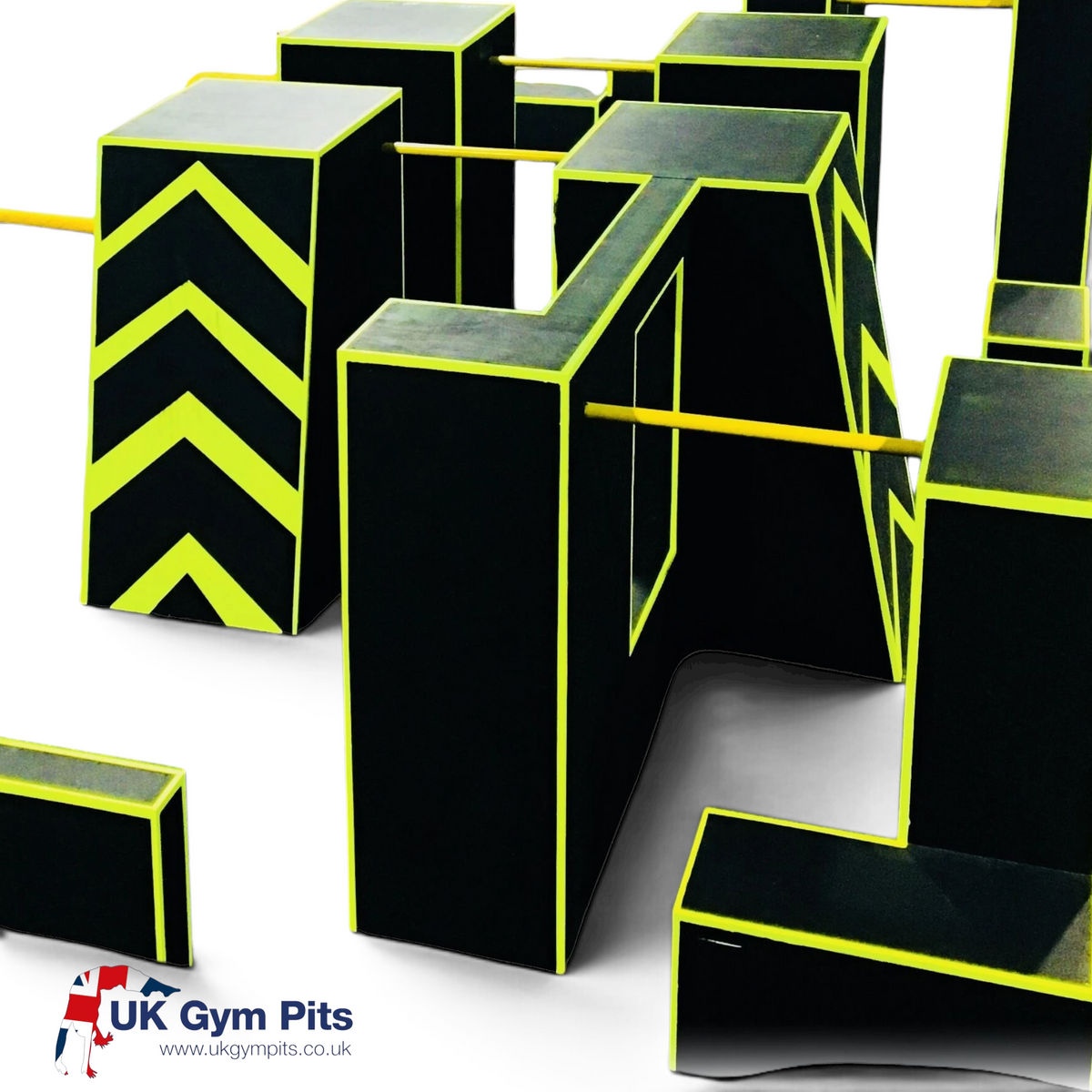 UK Gym Pits freestyle urban gym parkour blocks with black and yellow chevron safety markings and yellow swing bars