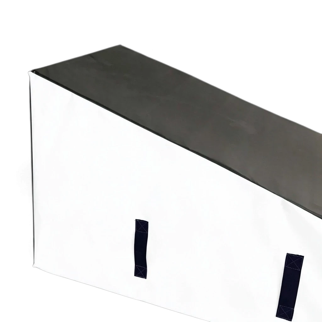 UK Gym Pits parkour wedge block with black top and white sides, featuring durable PVC and convenient carry handles.