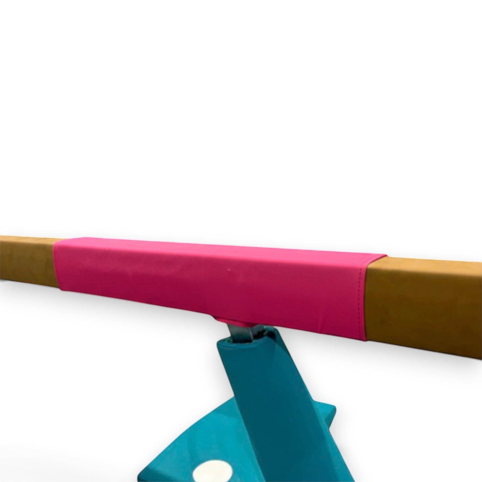 UK Gym Pits pink cushioned gymnastics beam mat with anti-slip faux leather surface secured on a training beam