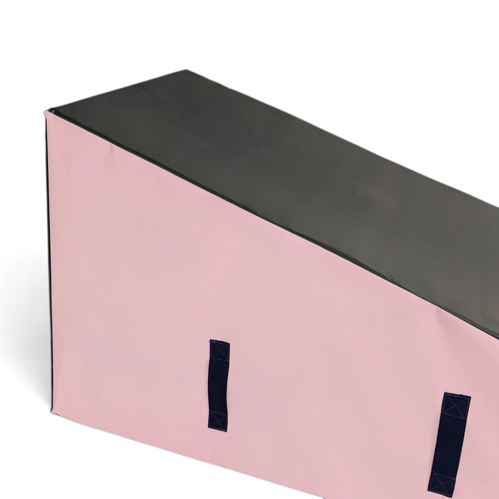 UK Gym Pits parkour wedge block with black top and pink sides, featuring sturdy carry handles for training.
