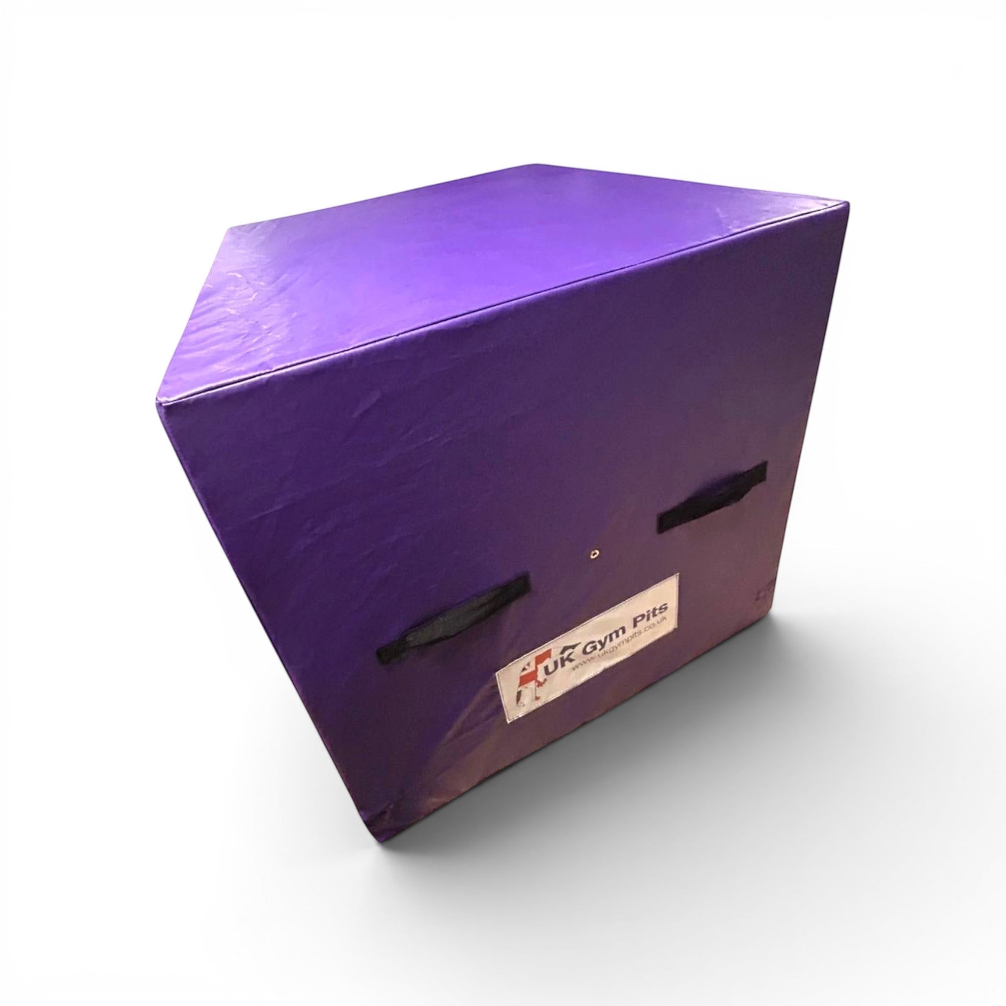 UK Gym Pits purple PVC gymnastics spotting and coaching block with heavy duty handles on a white background