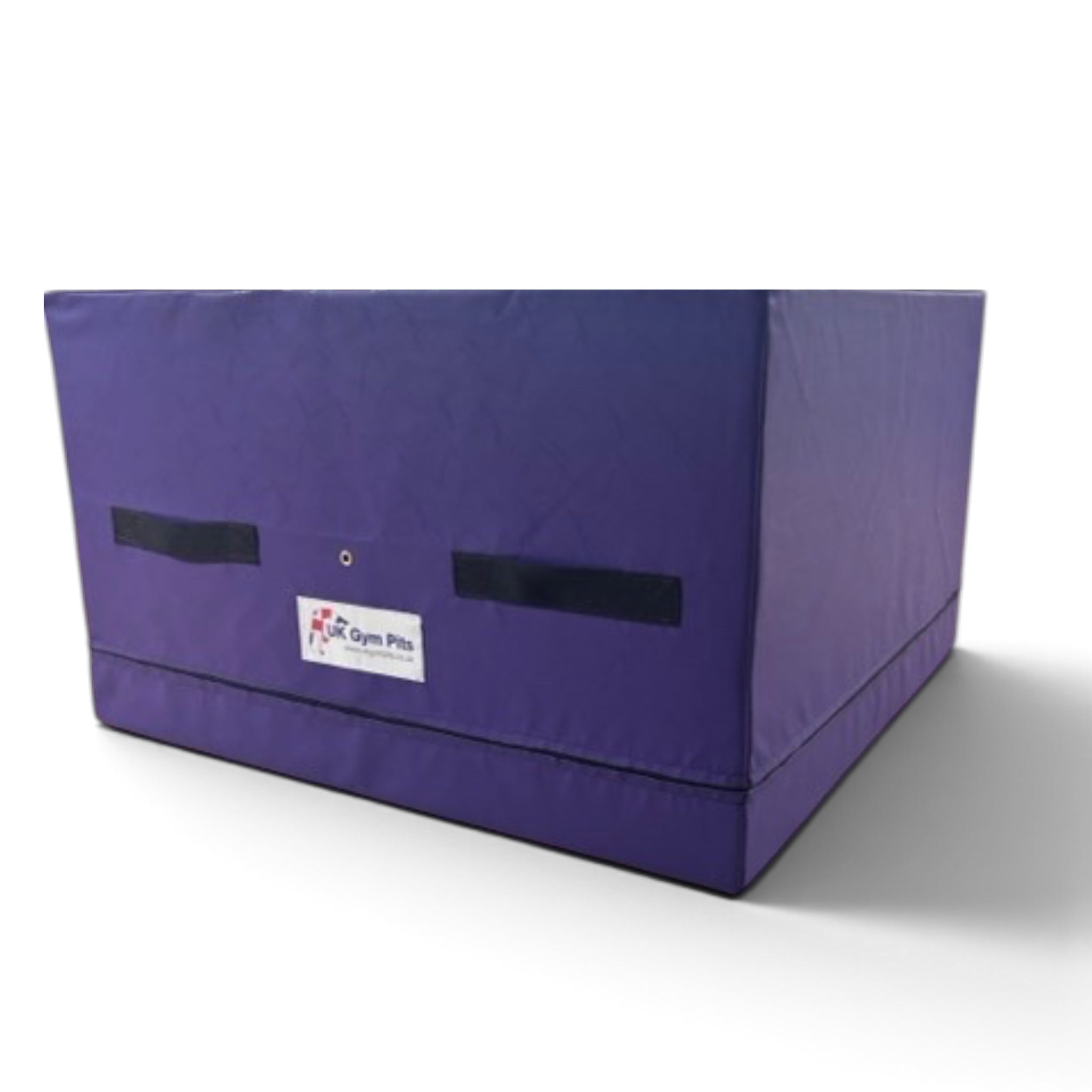 UK Gym Pits purple PVC gymnastics spotting and coaching block with heavy-duty handles on a wooden floor