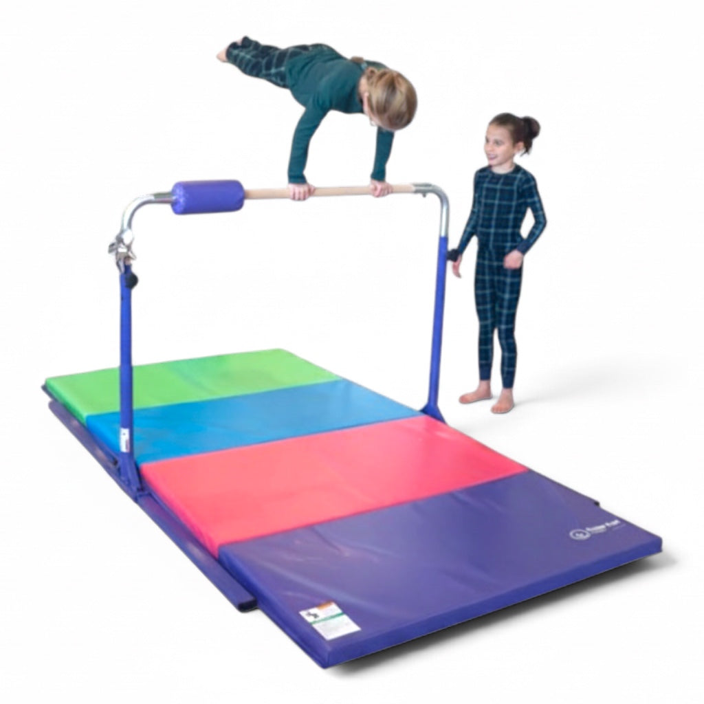 UK Gym Pits purple gymnastics kip bar with maple wood rail and multi-coloured folding mat for home training