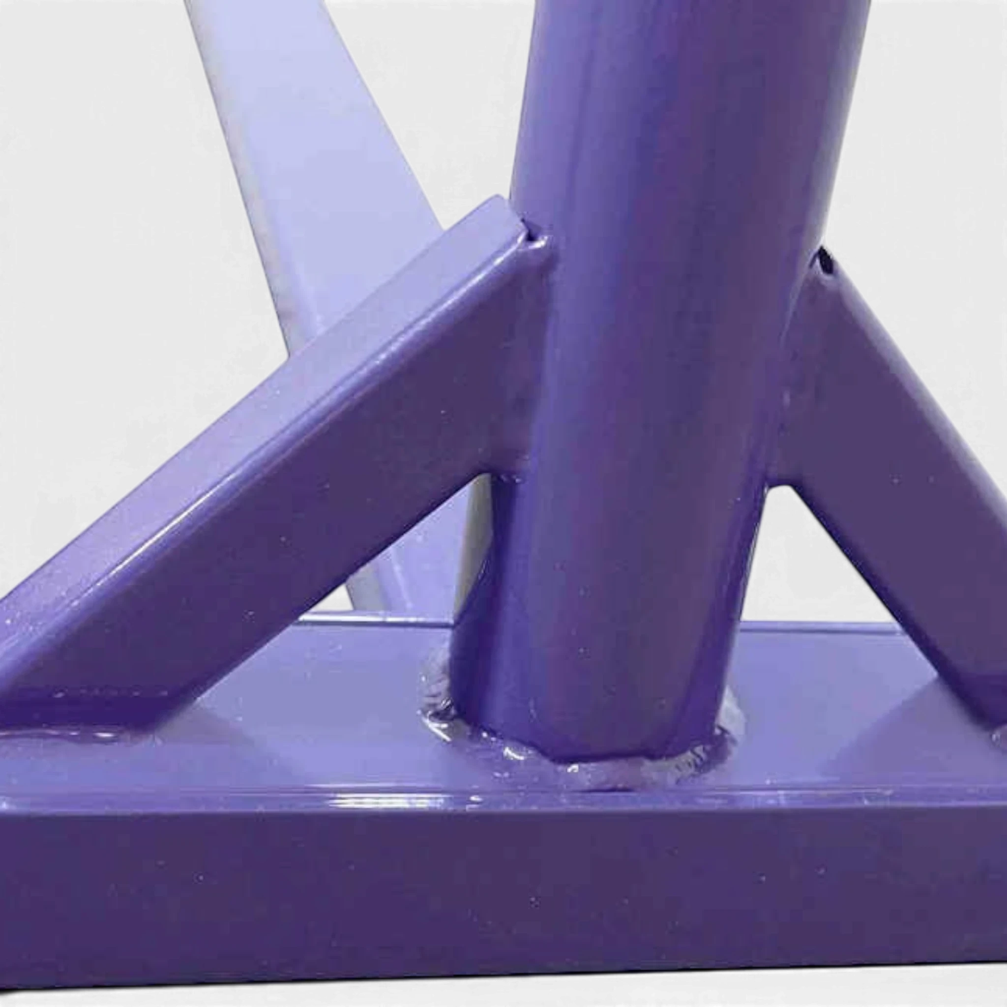 UK Gym Pits purple powder coated steel frame detail of a junior gymnastics kip bar for home training