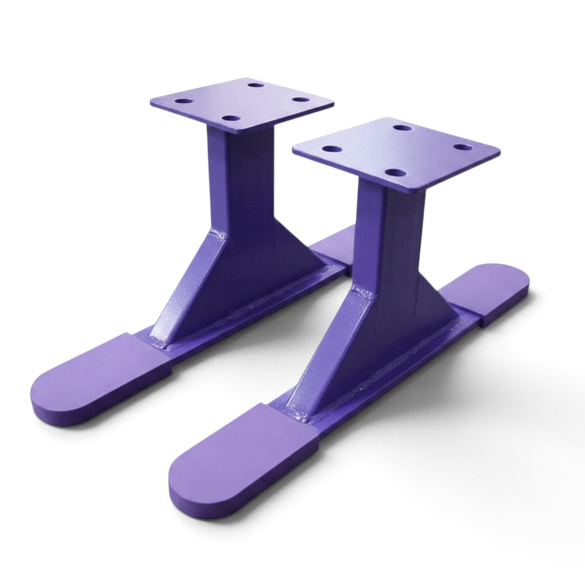UK Gym Pits Addie Beam Riser Legs in purple steel with rubber-coated feet for gym equipment stability.