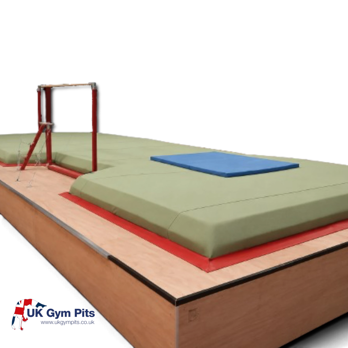 UK Gym Pits 60cm raised gymnastics landing pit with green resi-foam, red trim, and a blue landing mat.
