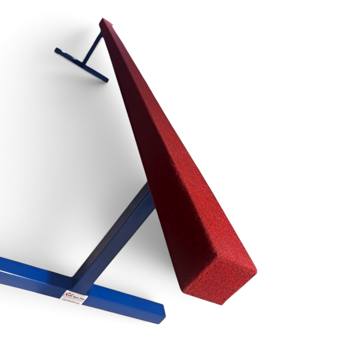 UK Gym Pits raised training beam with a red carpeted surface and blue powder-coated steel legs for gymnastics.