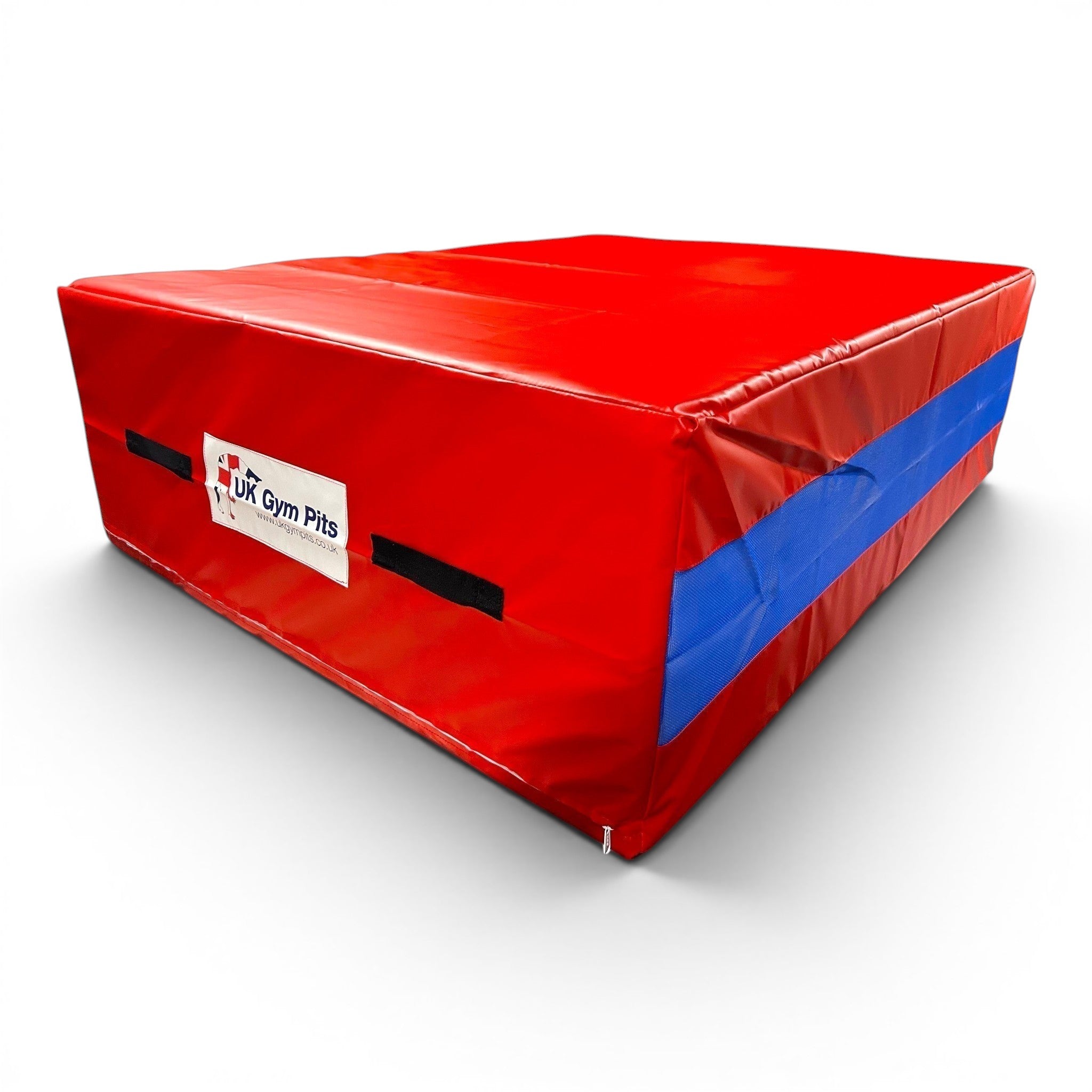 UK Gym Pits red and blue shock-absorbing resi foam landing pit with heavy-duty handles and anti-slip base.